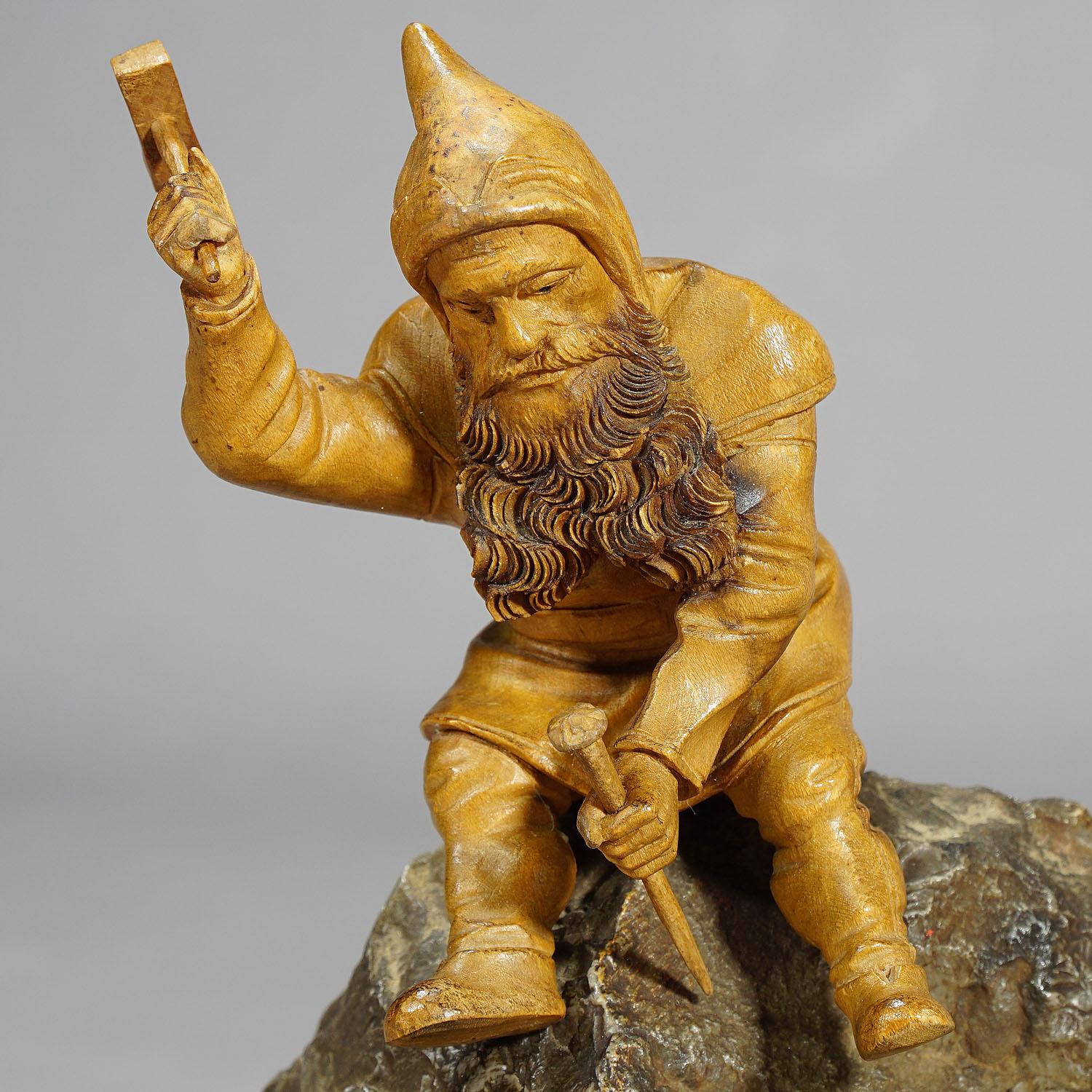 Wooden Carved Black Forest Dwarf Sitting on a Rock In Good Condition In Berghuelen, DE