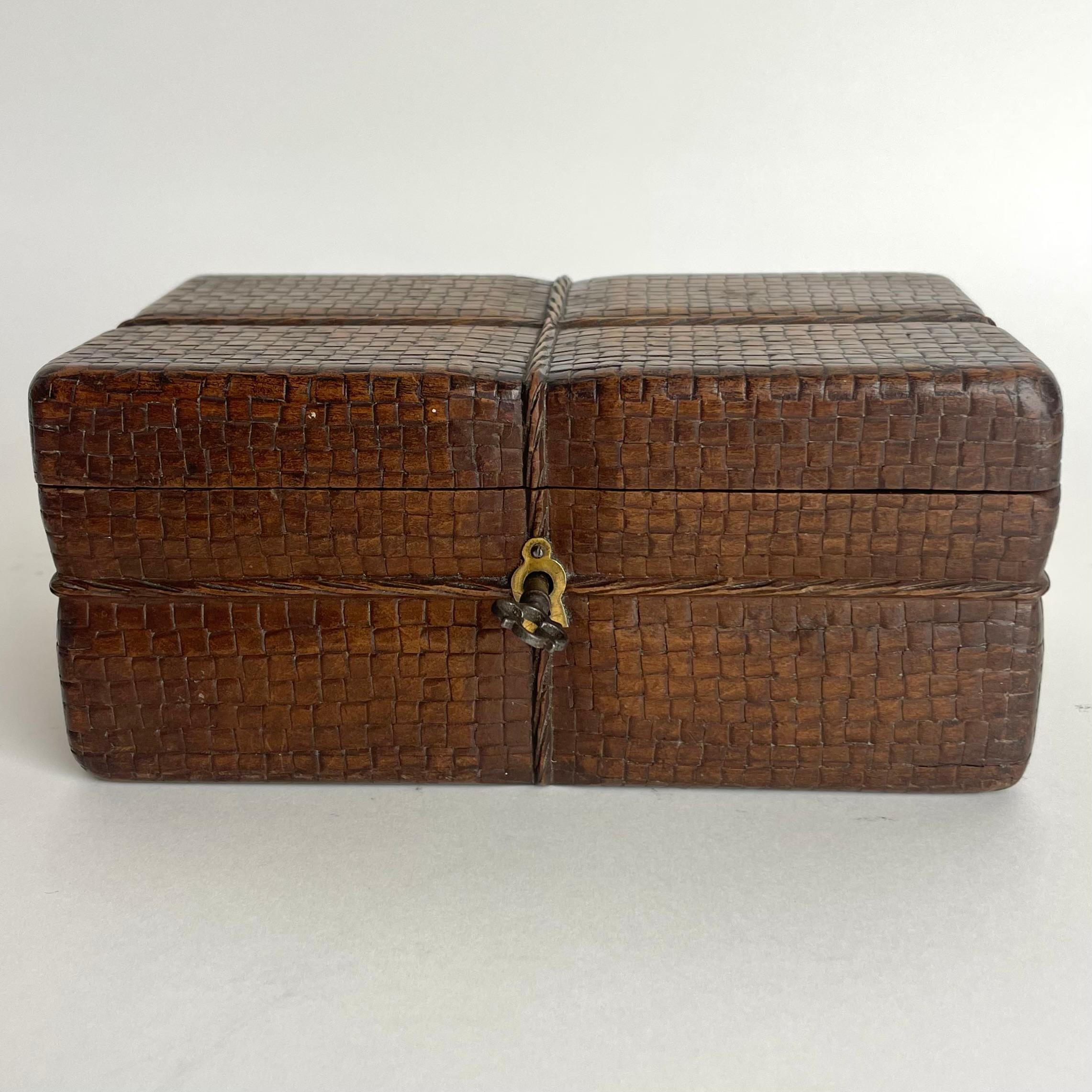 European Wooden carved box in the shape of a rattan box with a string. Mid-19th Century For Sale