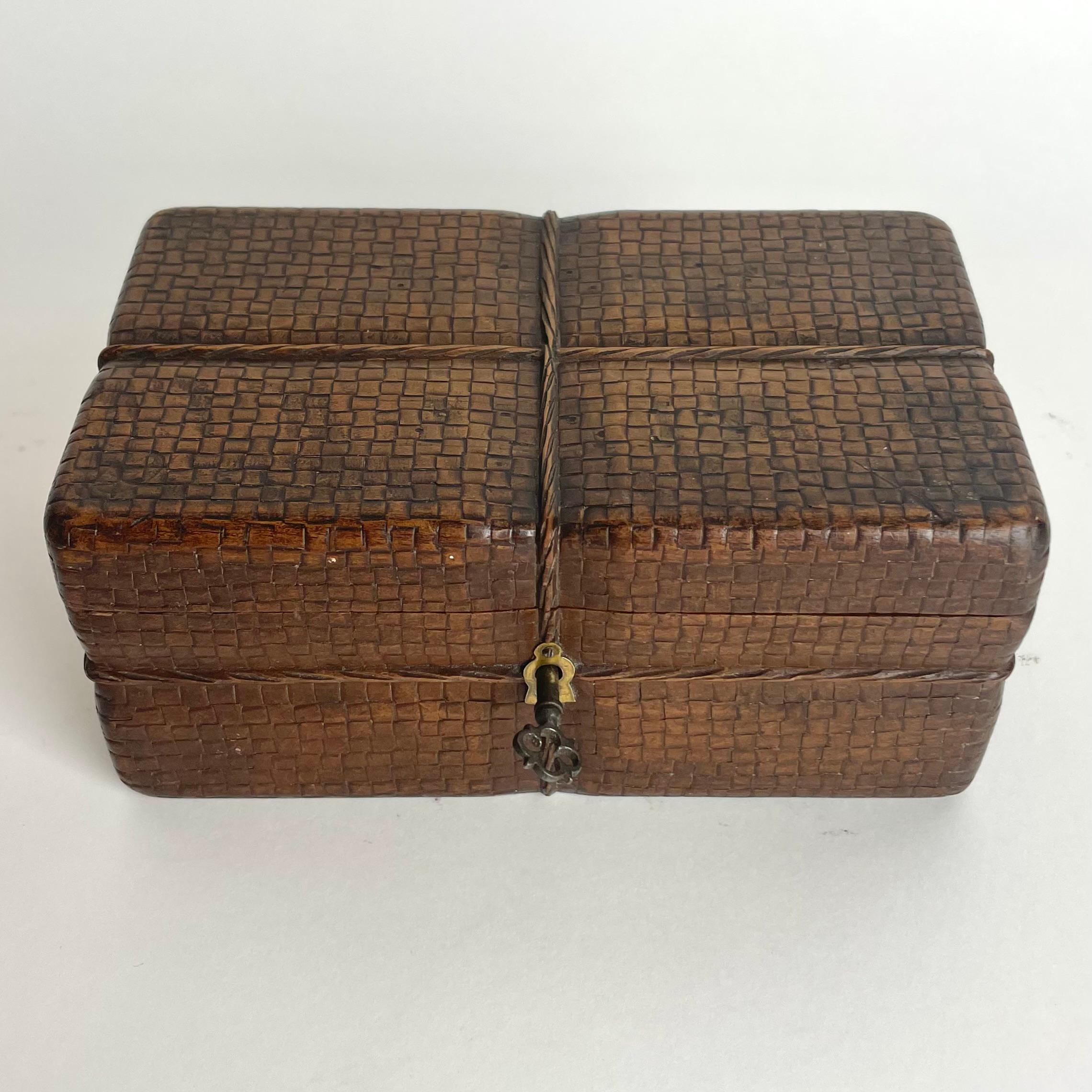 Wooden carved box in the shape of a rattan box with a string. Mid-19th Century In Good Condition For Sale In Knivsta, SE