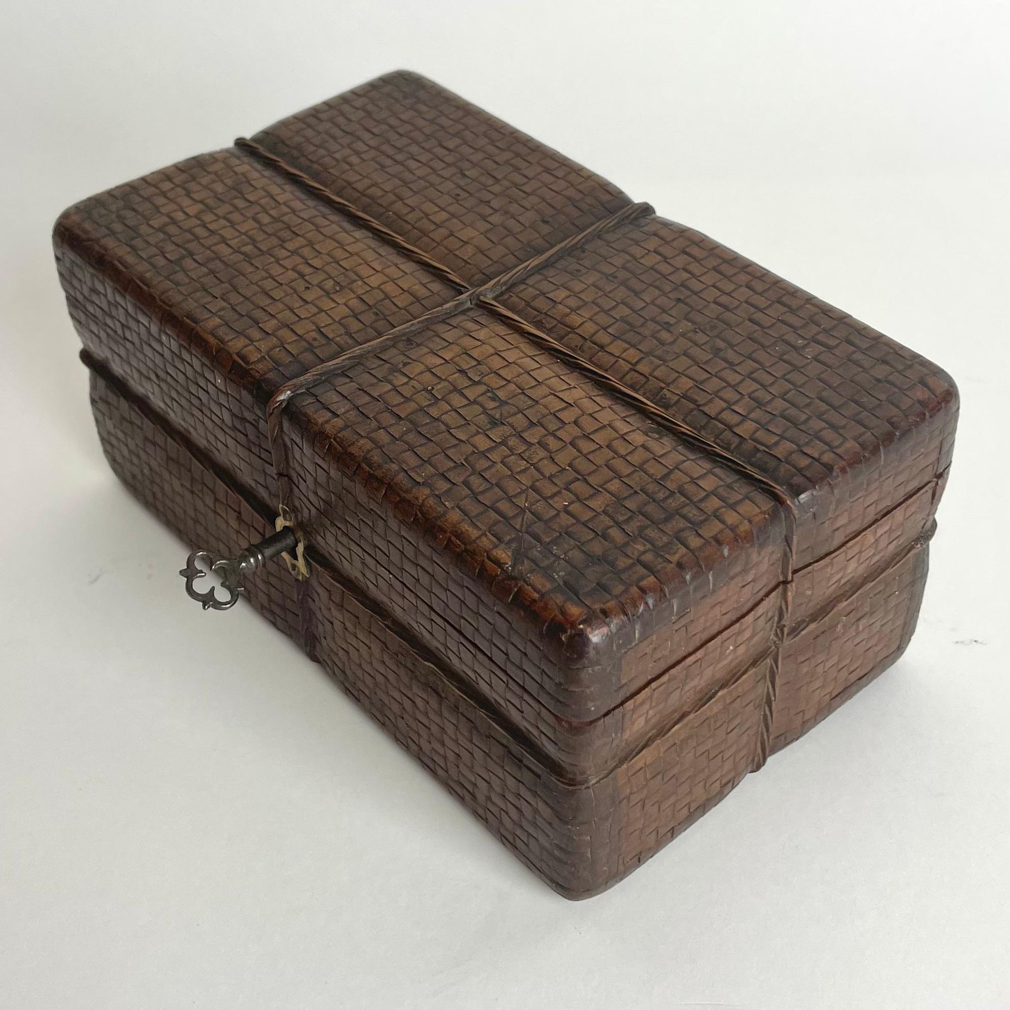 Birch Wooden carved box in the shape of a rattan box with a string. Mid-19th Century For Sale