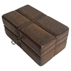 Wooden carved box in the shape of a rattan box with a string. Mid-19th Century