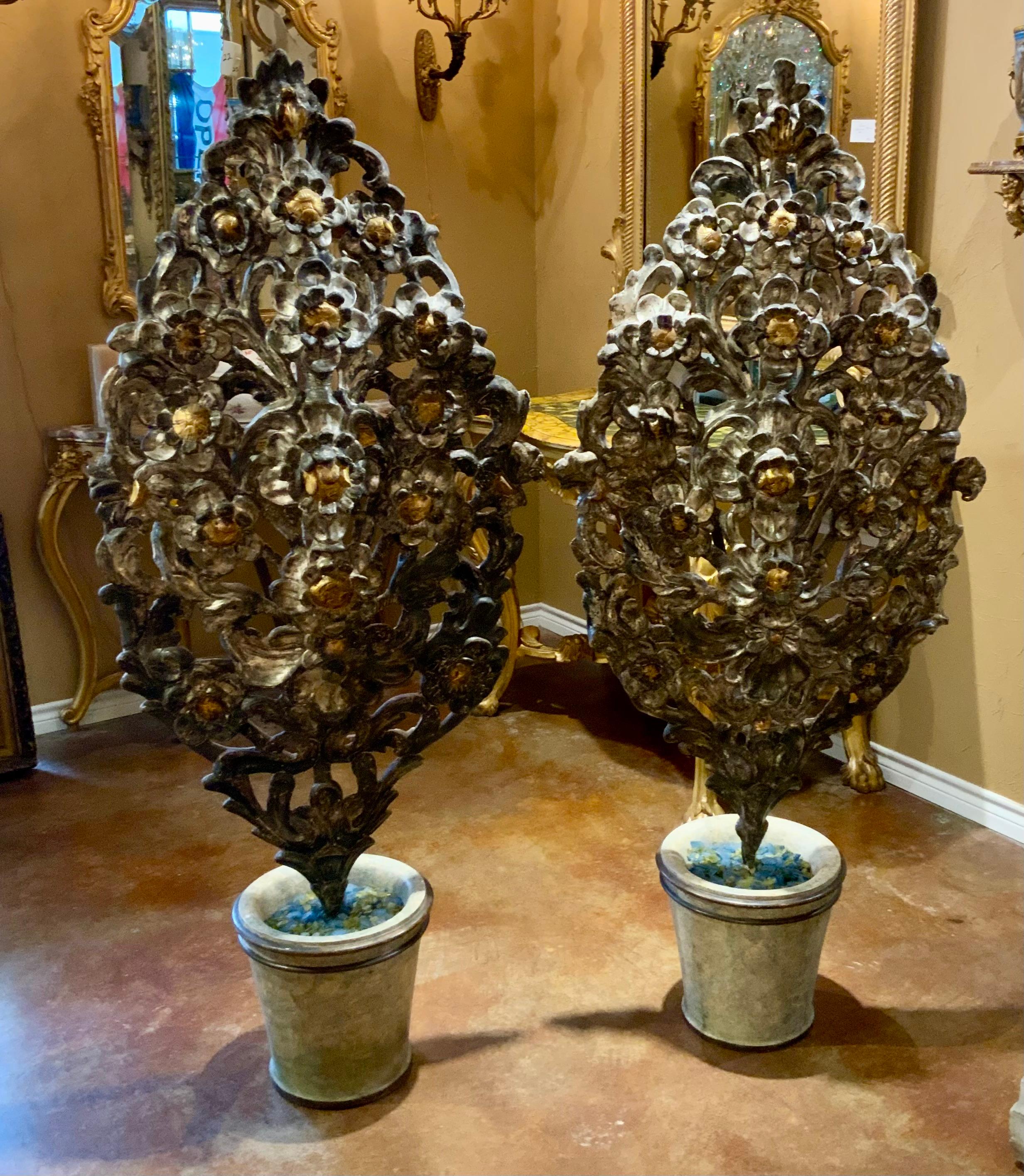 Hand-Carved Wooden carved pair of topiaries in silver and gold gilt For Sale
