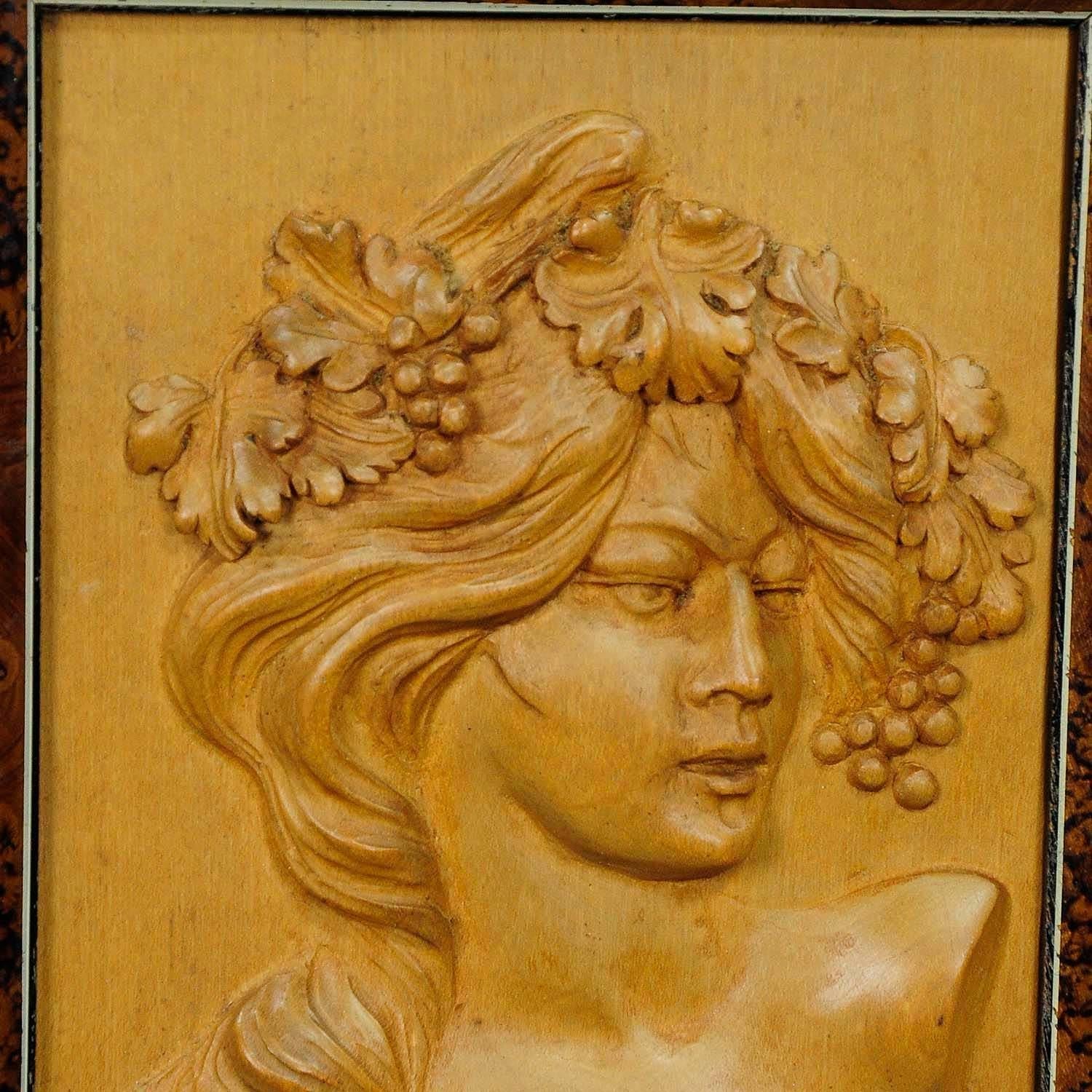 A lovely wooden wall application depicting a Victorian lady with grapes and wine leaves in her hair. Handcarved circa 1920 in Germany.
Measures: width: 5.71