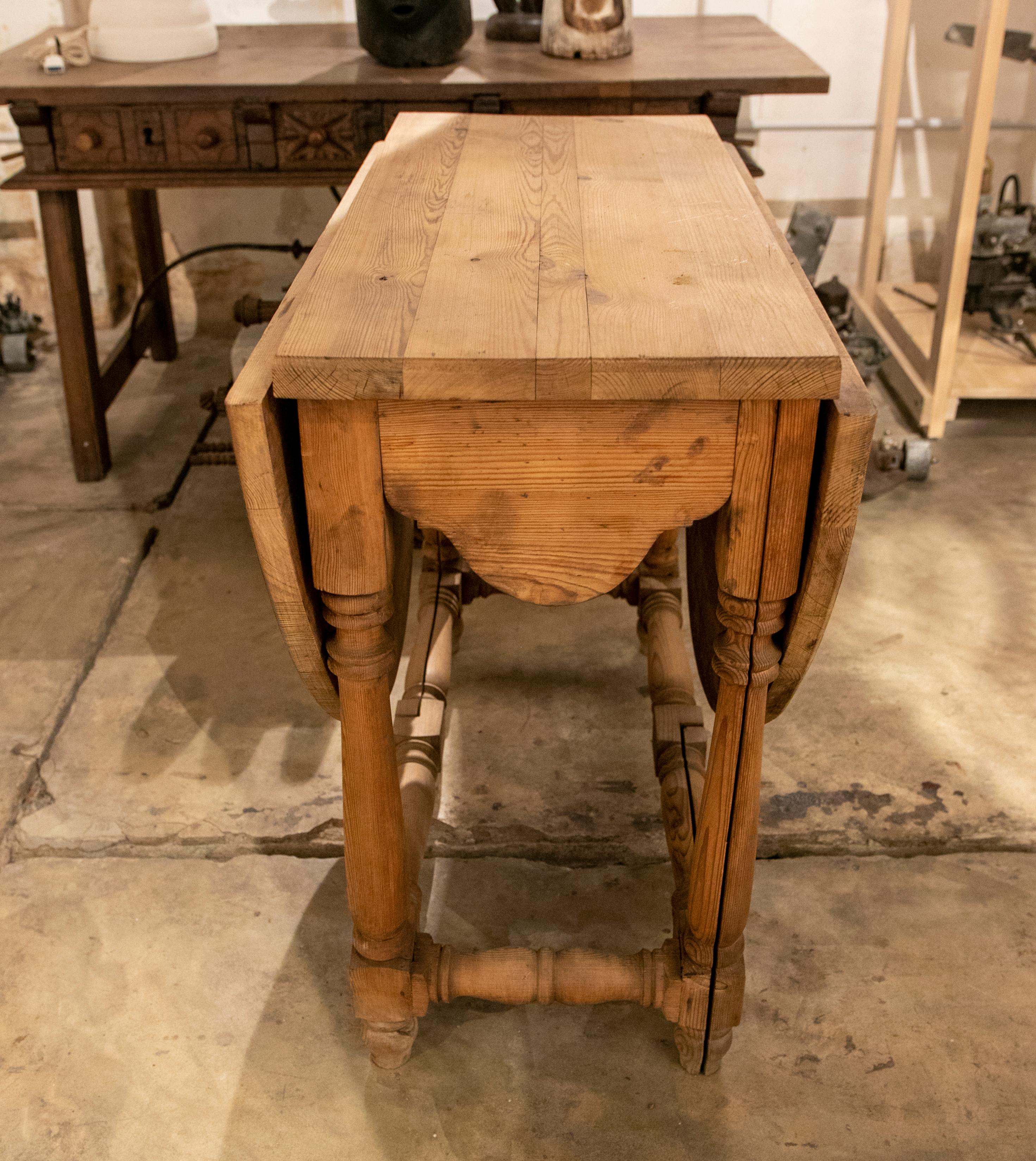 Wooden Carved Wing Table with Turned Legs and Hinged Sides 6