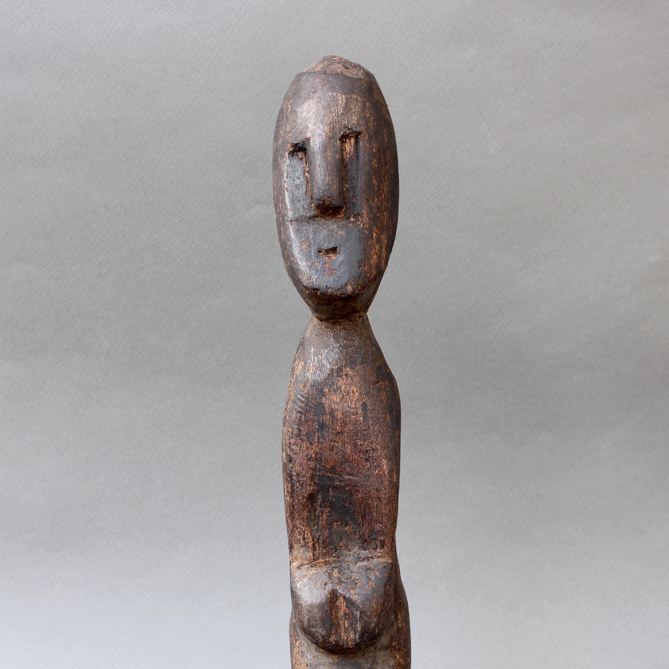 20th Century Wooden Carving / Sculpture of Kneeling Wooden Figure from Timor, Indonesia