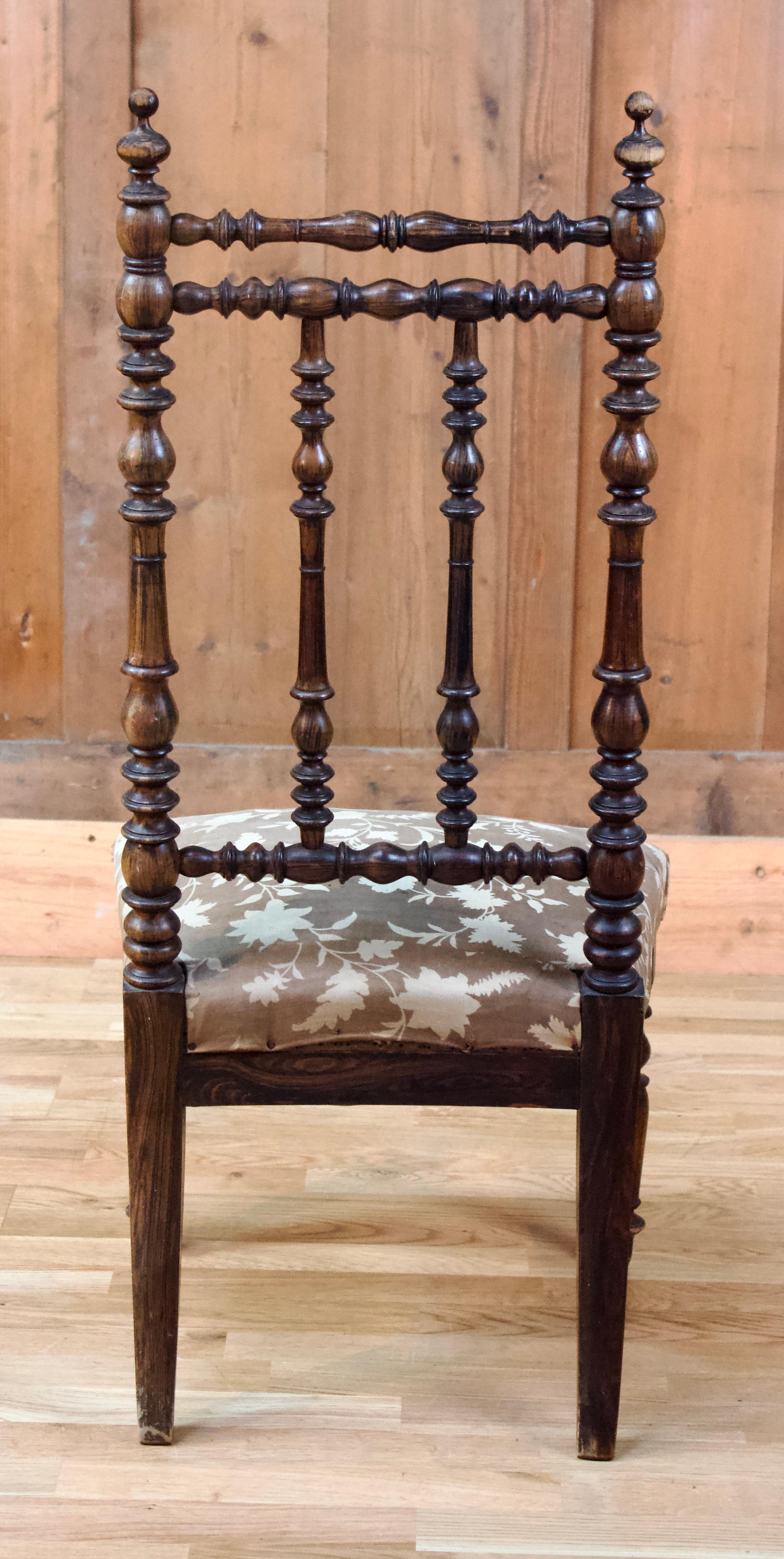 Pretty low chair from the Napoleon III period with a very beautiful turned wooden backrest. This type of chair with a particularly low seat is also called nursing chair, making it easier to take care of children.
France Circa 1850.