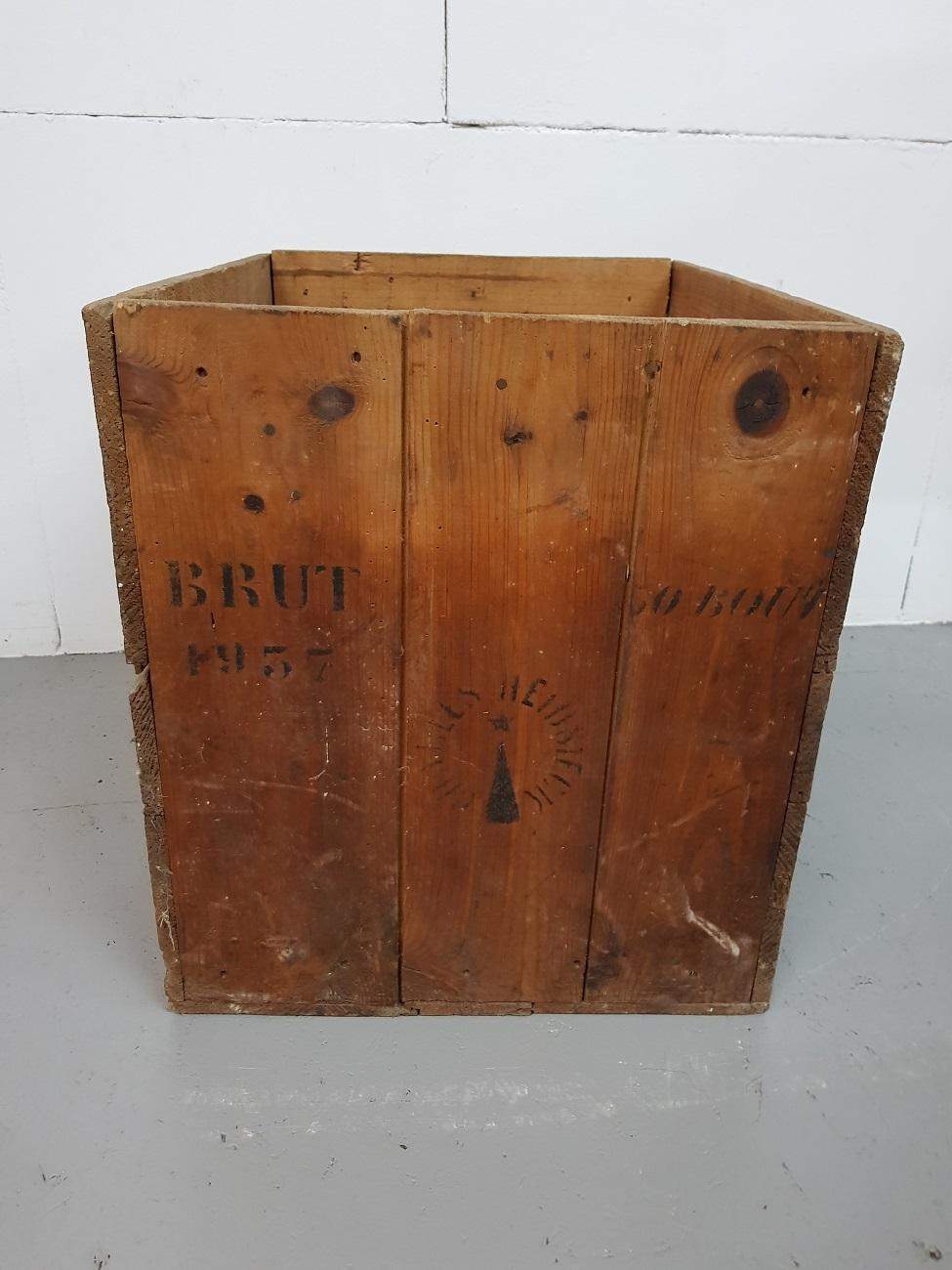 Beautiful Old Champagne crate for 50 bottles from the company Charles Heidsieck for export to Germany dated 1937 in the time of Nazi Germany.

The measurements are,
Depth 39 cm/ 15.3 inch.
Width 48 cm/ 18.8 inch.
Height 43 cm/ 16.9 inch.
     