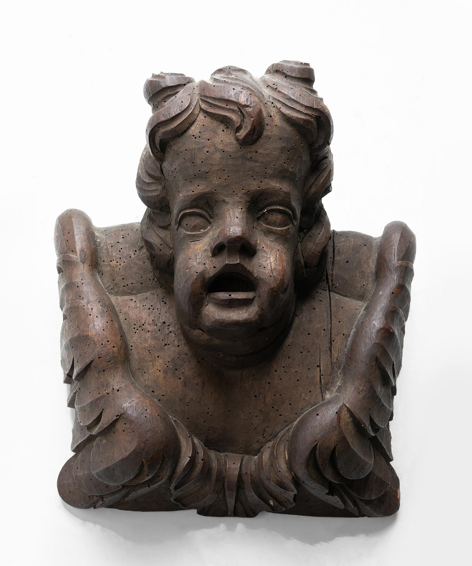 Wooden cherub, Italy 18th century.

Beautifully carved sculpture with original patina.