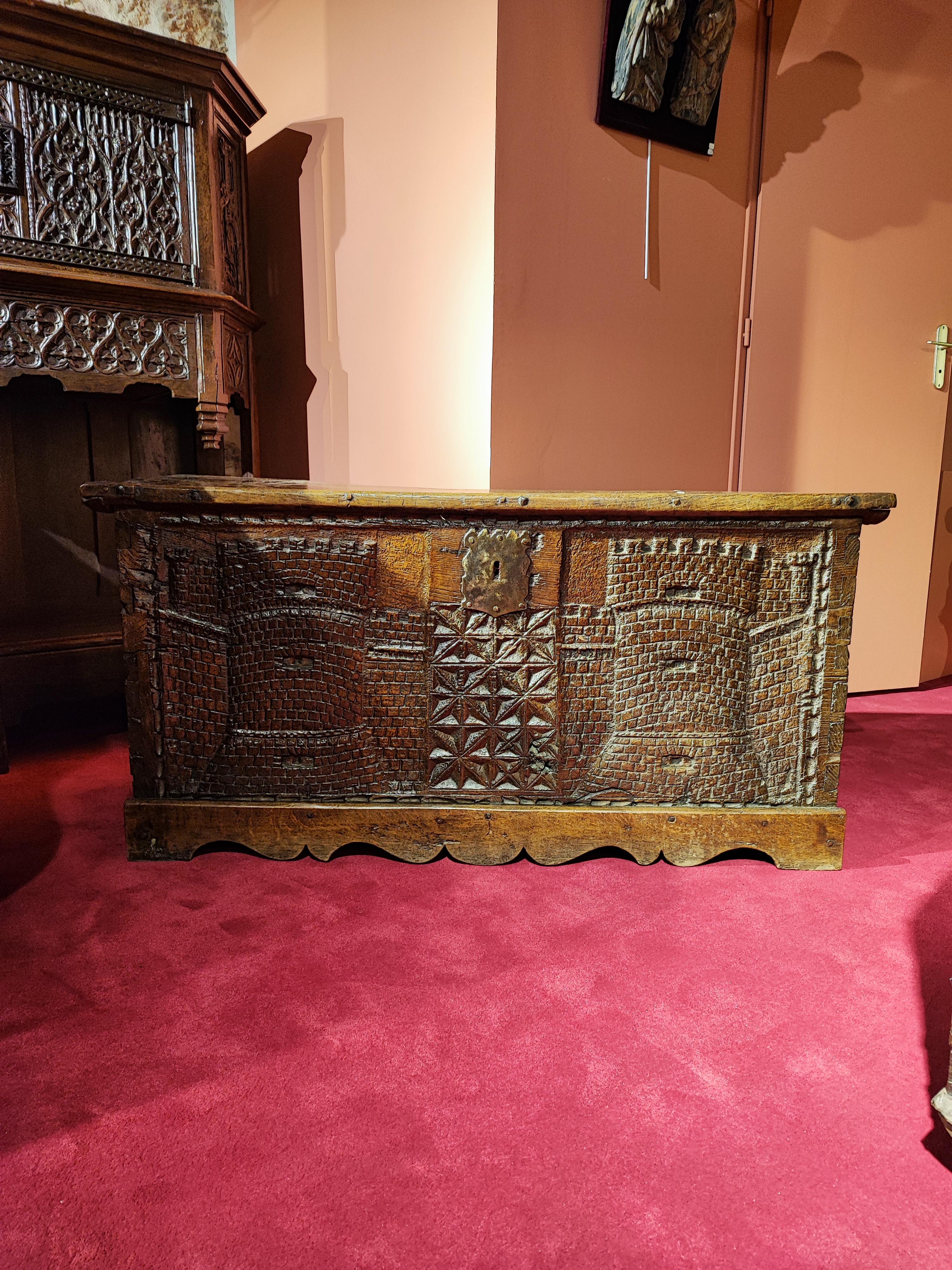 18th Century and Earlier Wooden Chest Carved with Two Crenellated Towers For Sale