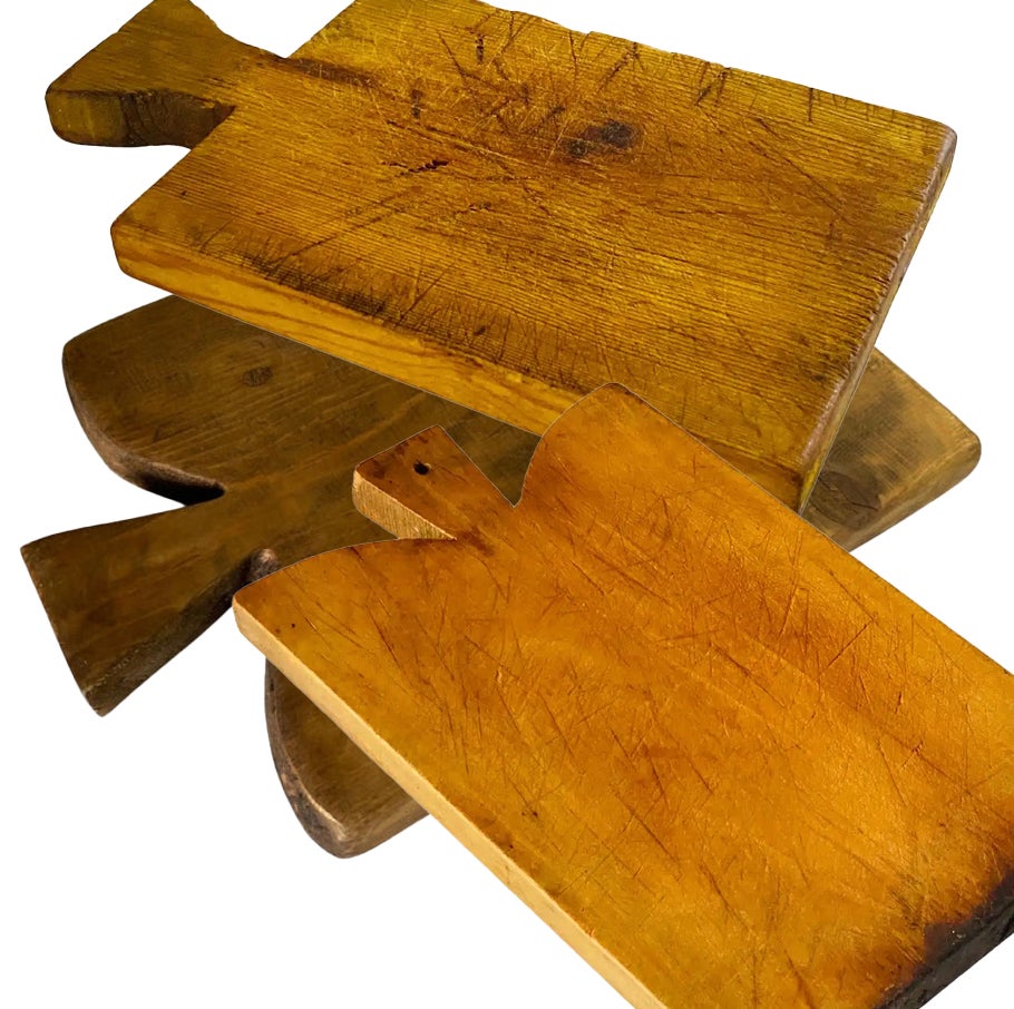 Wooden cutting boards, with its old patina. They are object of the French 20th century, in the style of French Provincial which is brown in color, and in a condition consistent with its age and use.
Dimensions:
Height: 1.97 in (5 cm)Width: 19.69