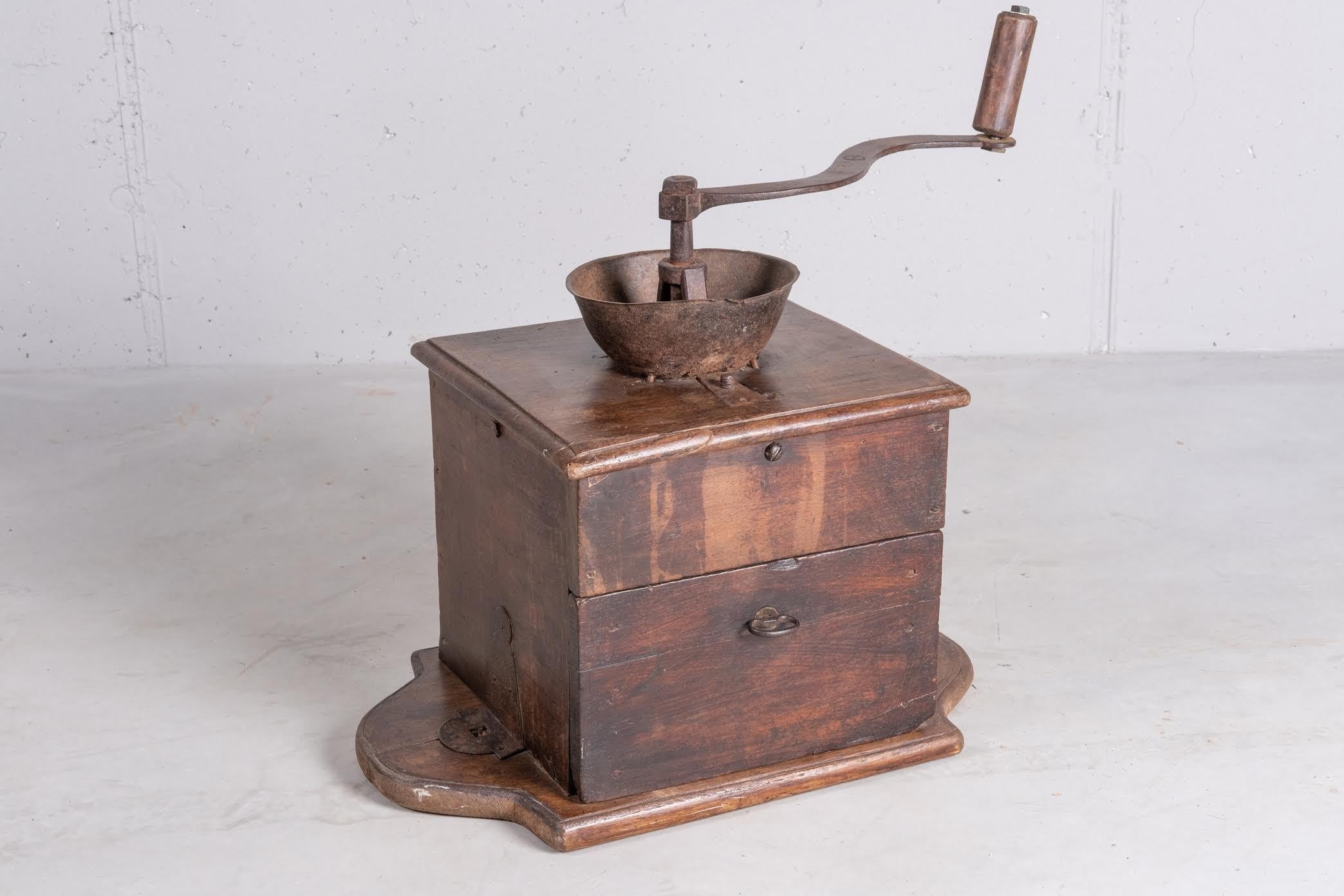 Big walnut coffee grinder, features an amazing patina and all the original metal parts.