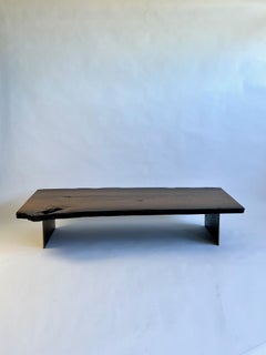 Wooden coffee table with steel base