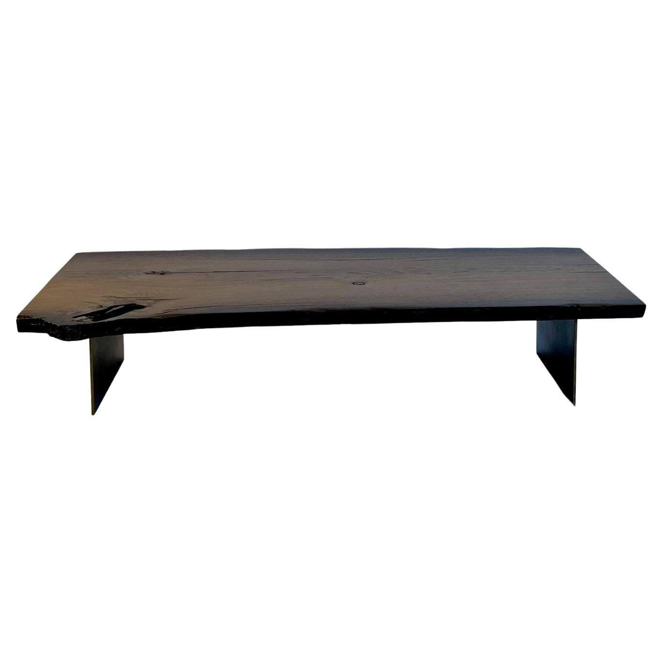 Wooden coffee table with steel base