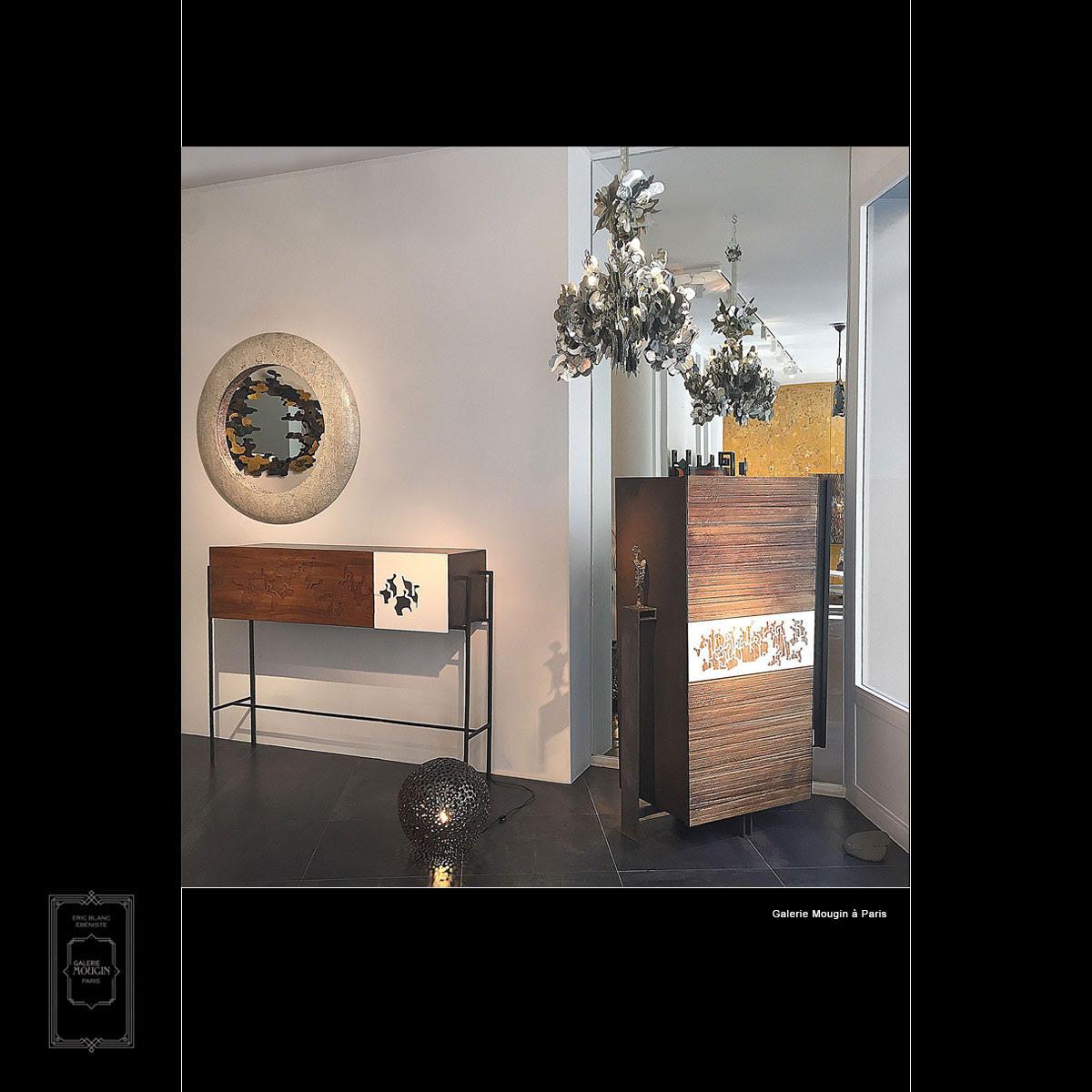 This is a beautiful cupboard with interior shelves handmade and designed in France by Eric Blanc. The front is covered with a unique artwork by artist Gaetan de Seguin. It is a captivating piece of furniture, elegant and minimalistic in its design.