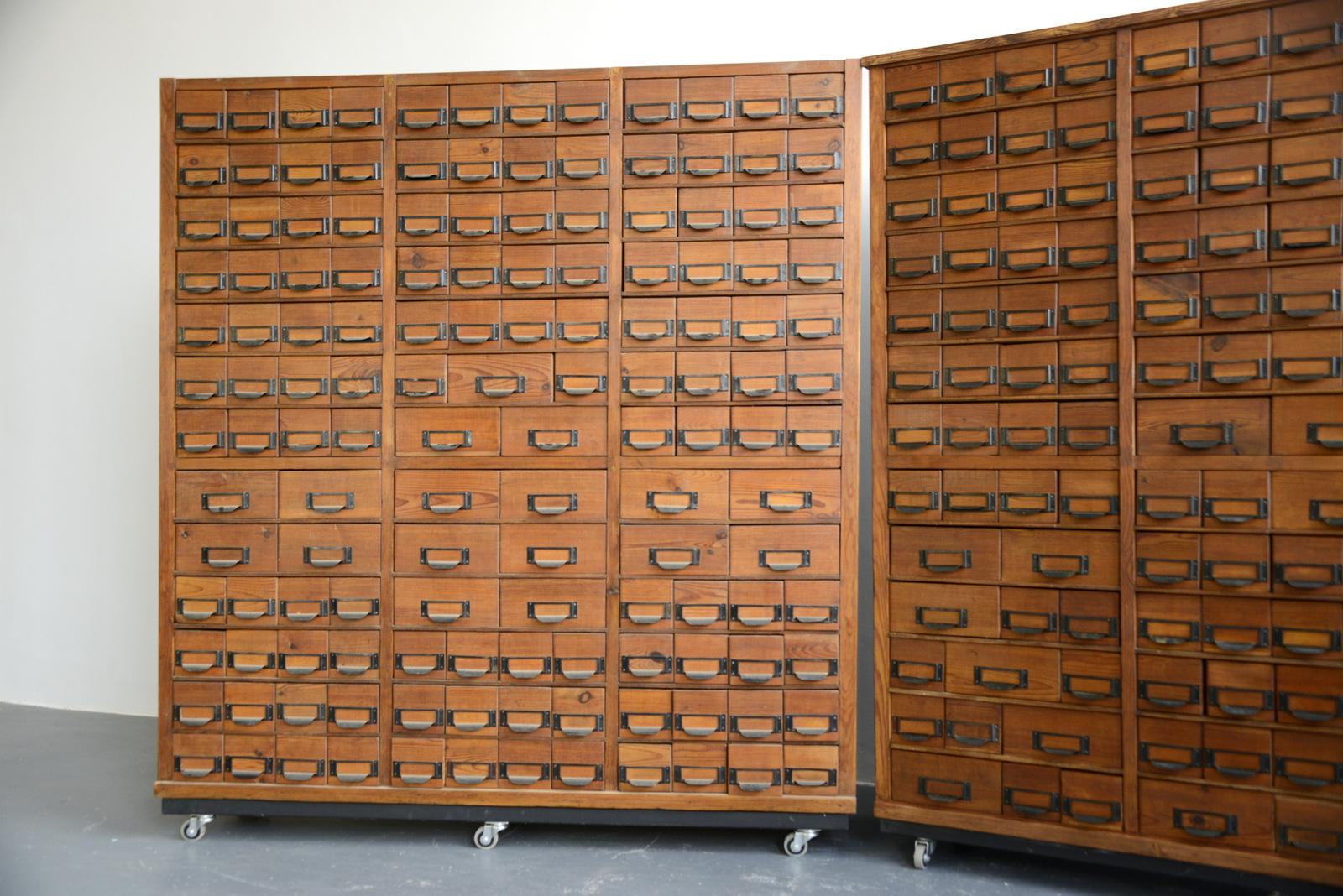 Wooden dental surgery record cabinets, circa 1950s

- Price is per cabinet (2 available)
- Solid pine cabinet and drawers
- Original steel handles with label holders
- Originally used in a dental surgery for patients records
- Polish 1950s
-