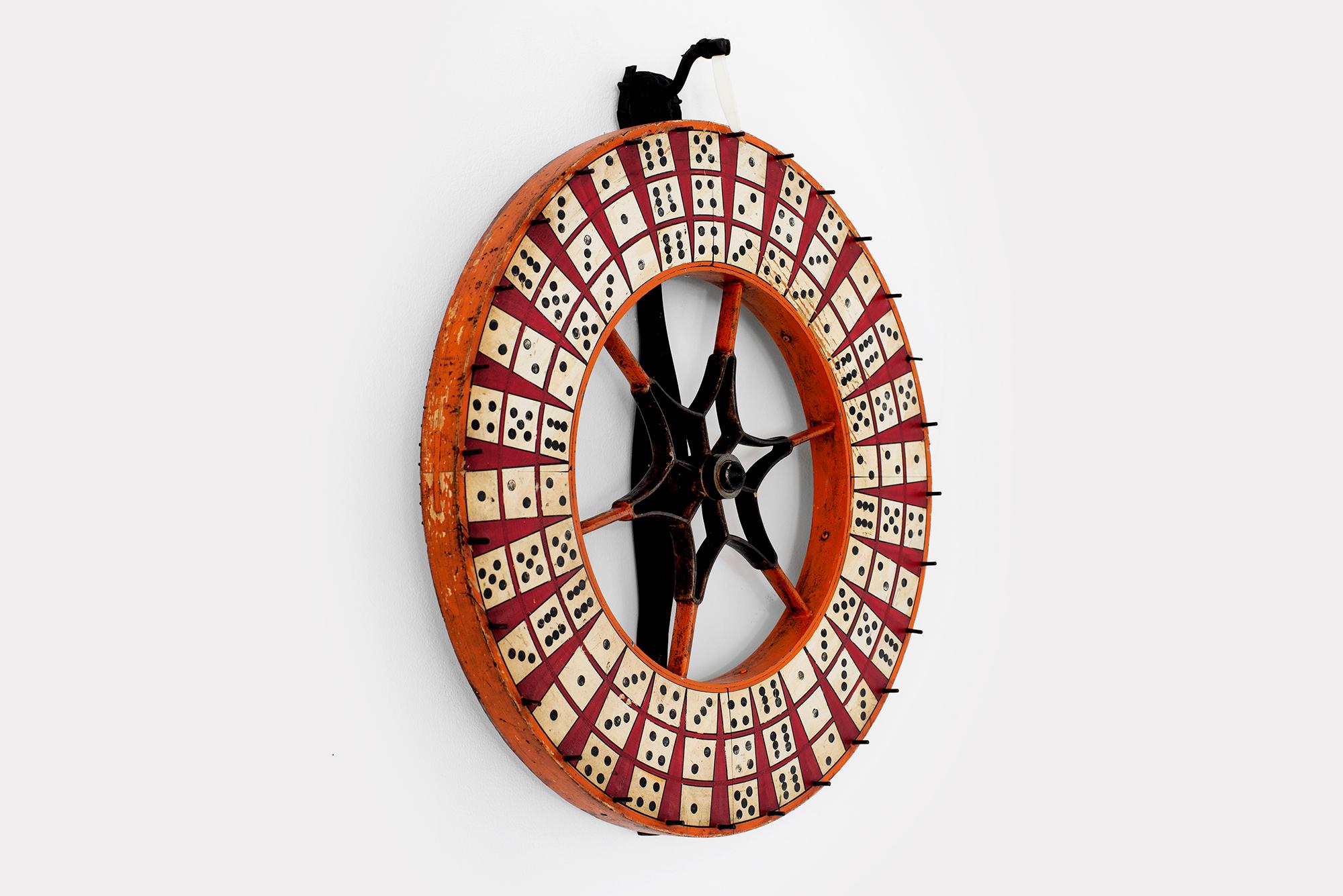 Vintage wooden dice game gambling wheel -
This wheel could have been used in a gaming parlor or at a Carnival, where landing on the correct number of dice would win a prize.
Nicely constructed with hand forged iron with great colors and patina to
