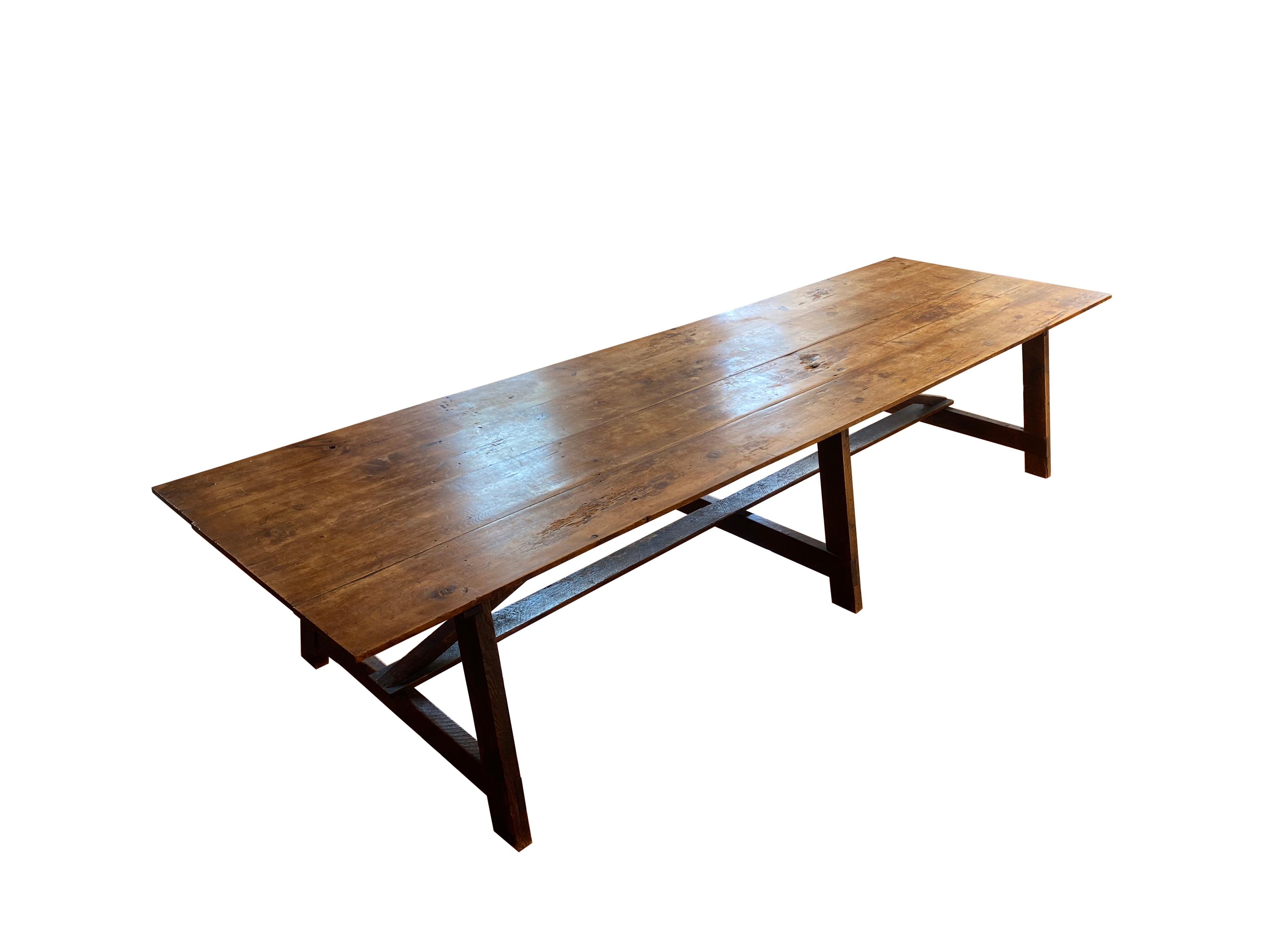 Farmhouse table made out of 19th century reclaimed barnwood from Oregon. The table was modeled off antique French farmhouse tables made of fruitwood and has the same feeling and appearance of an antique piece. Years of wear and use have created a