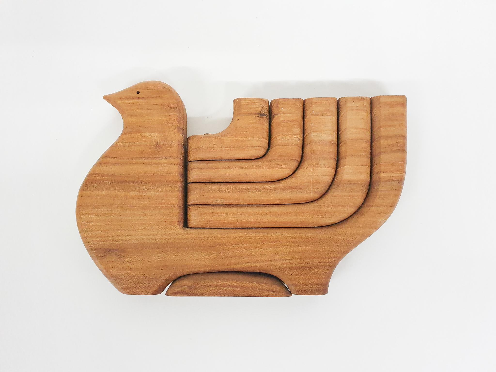 Wooden candelabra in the shape of a bird. By Taitra.
Marked at the bottom.
