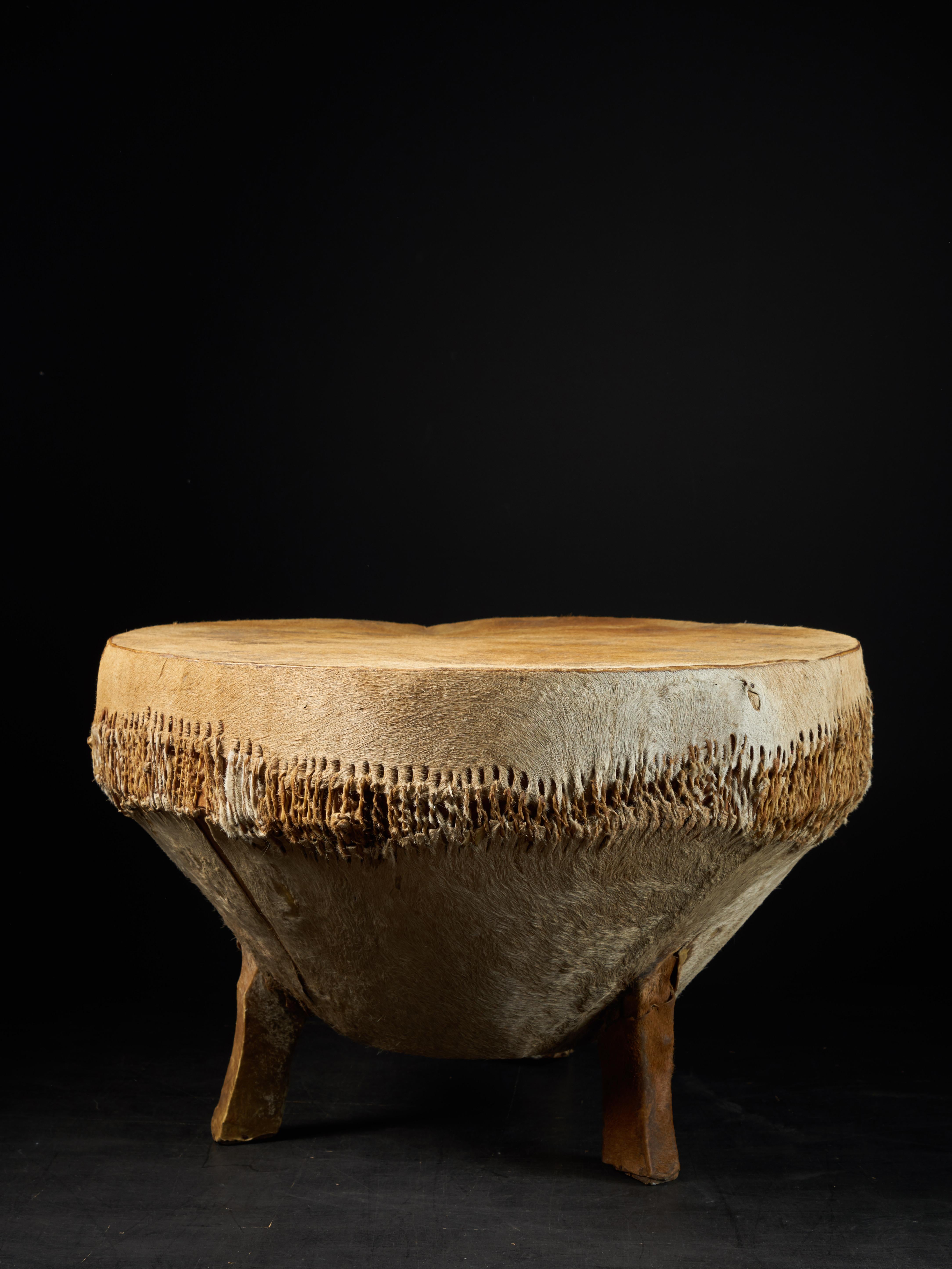 wooden drum made of animal skin
