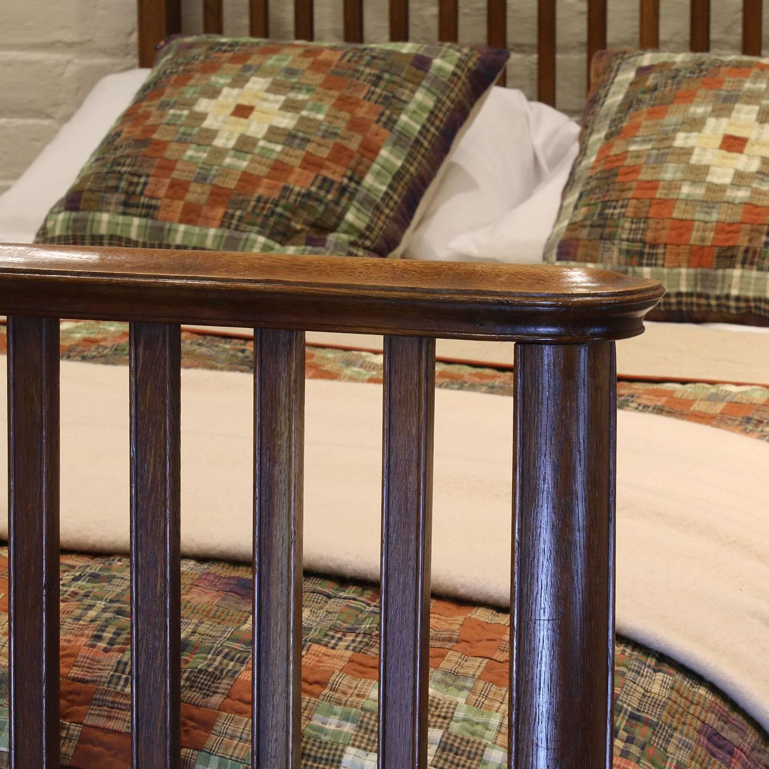 An attractive Edwardian wooden slatted bed in light oak.

This bed accepts a 4ft 6in wide double base and mattress set.

The price is for the bed alone - the base, mattress, bedding and bed linen are extra and available for purchase.
    