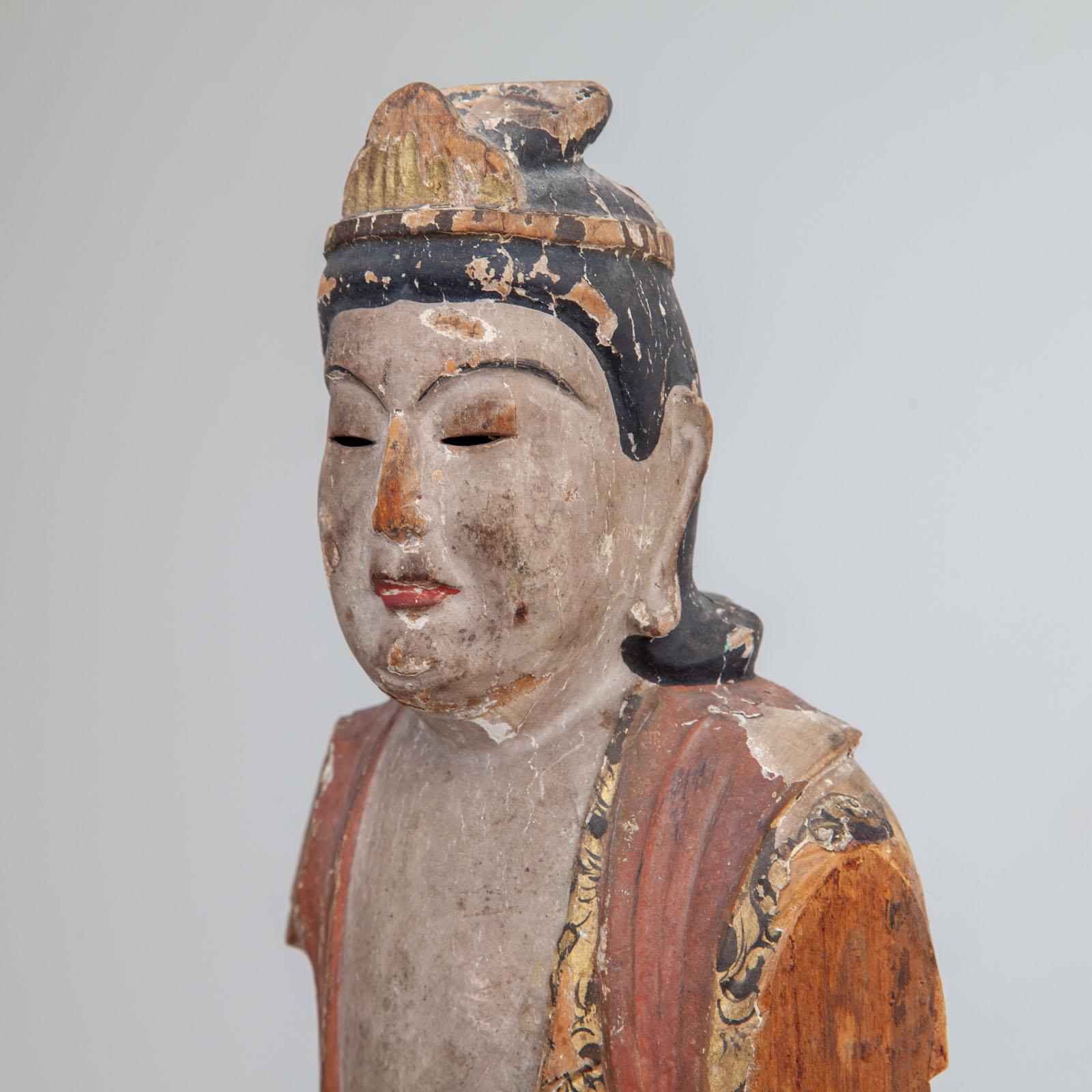 Carved and colourfully painted wooden figure of the Japanese Buddhist deity Kannon with a height of 49 cm (height with base: 56.5 cm). Kannon 觀音 (‘perceiving the prayers of the world’) is a Buddhist deity of East Asian culture and is one of the most