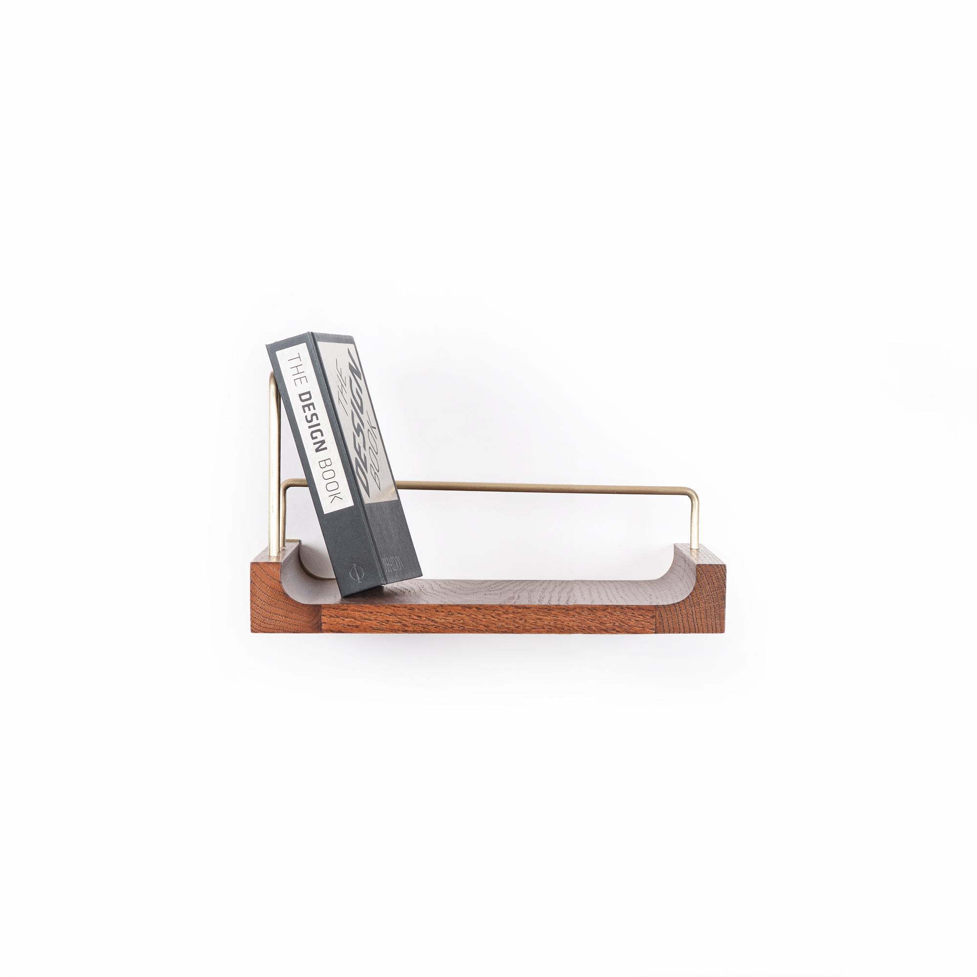 Brought to life with Ananas's innovative design, the wooden shelf with gold metal details is designed for use in a variety of spaces such as offices, living rooms, bedrooms, entryways, and bathrooms. Made from kiln-dried natural oak wood with a