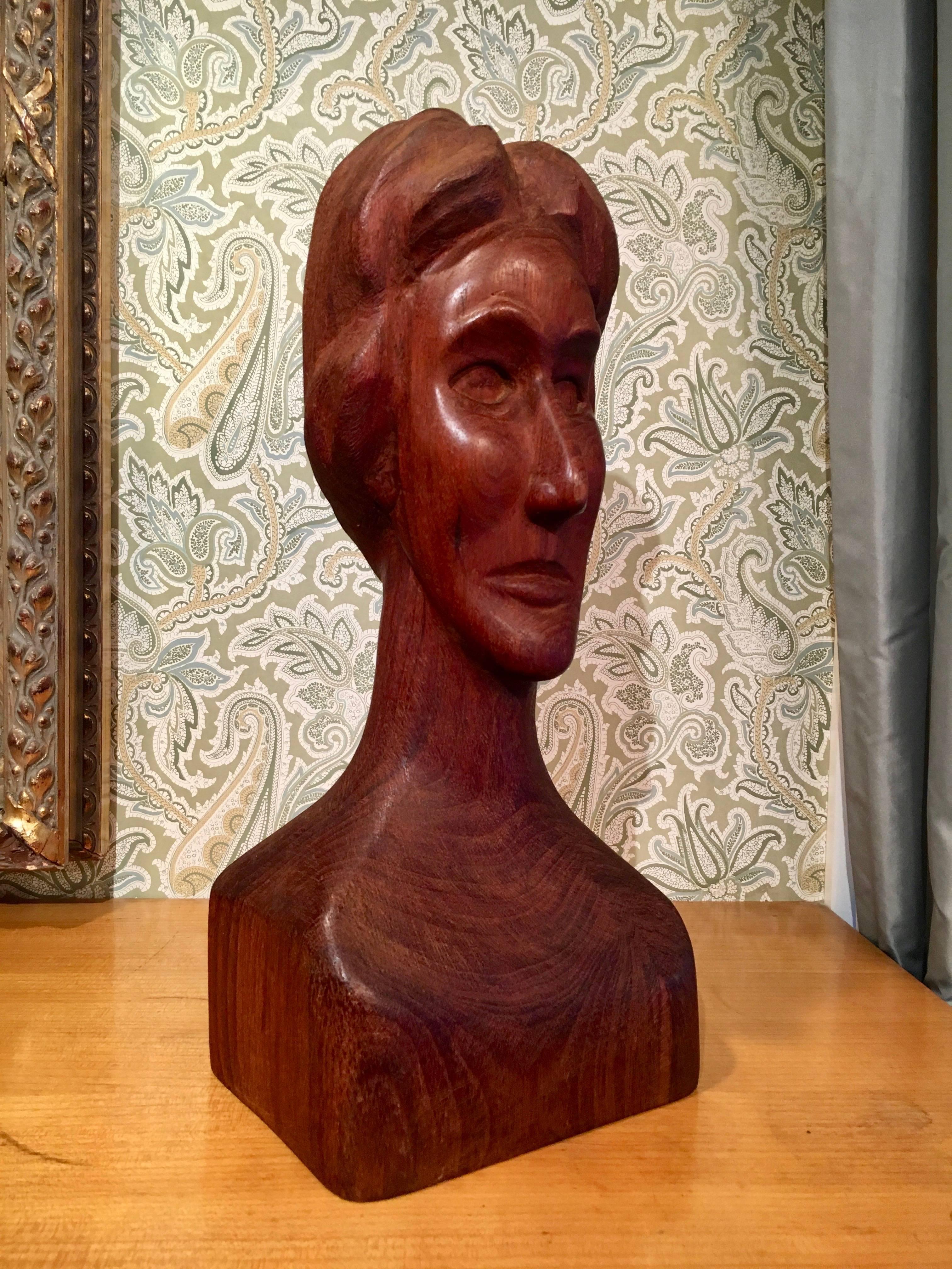 Wooden Folk Art sculpture of a woman - very well done with subtle, yet well detailed and implied offerings of a stern woman's face. Could easily be displayed on it's own pedestal or, better yet, as a definitive piece gracing a shelf, console or