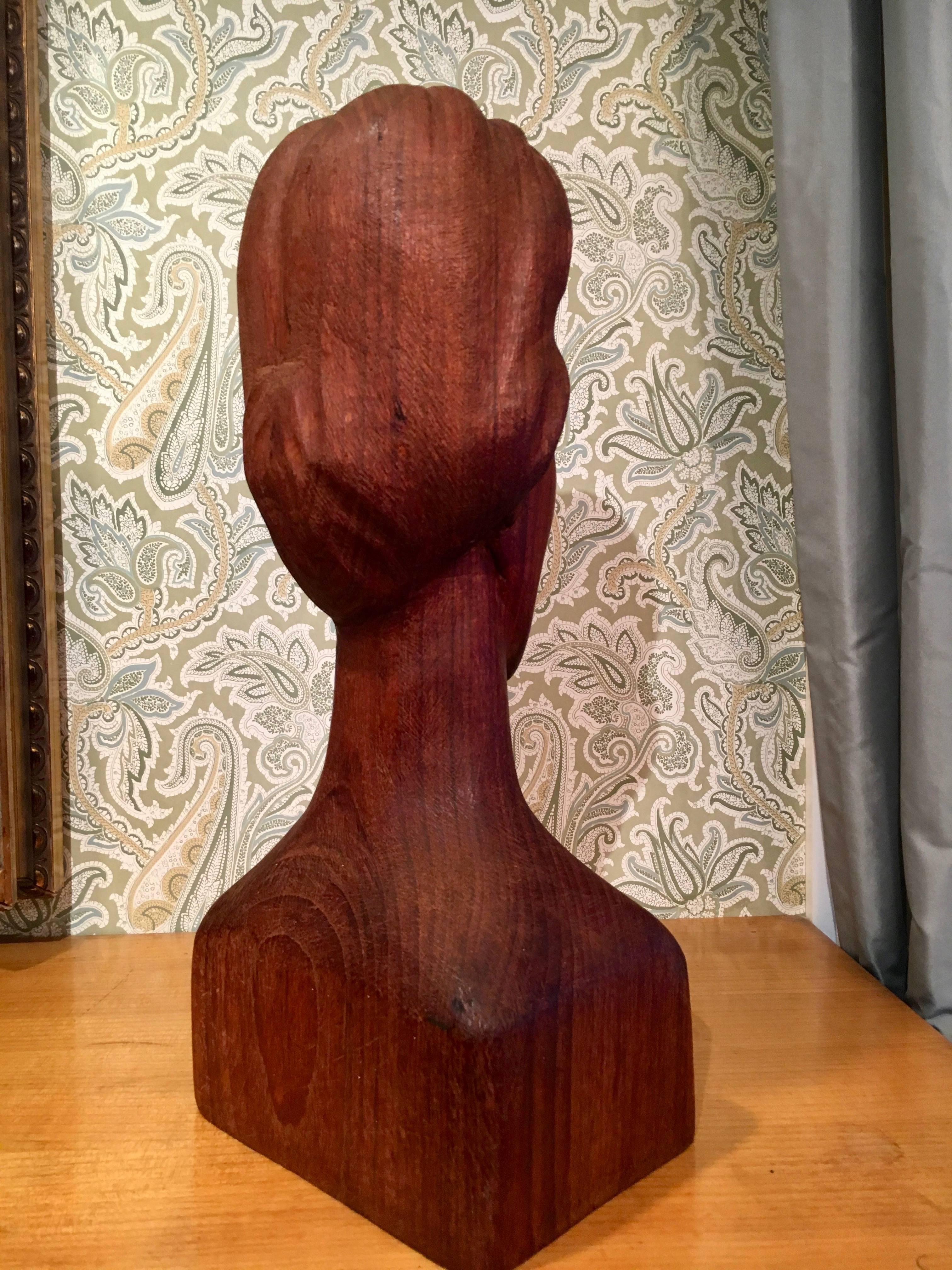 wooden woman sculpture
