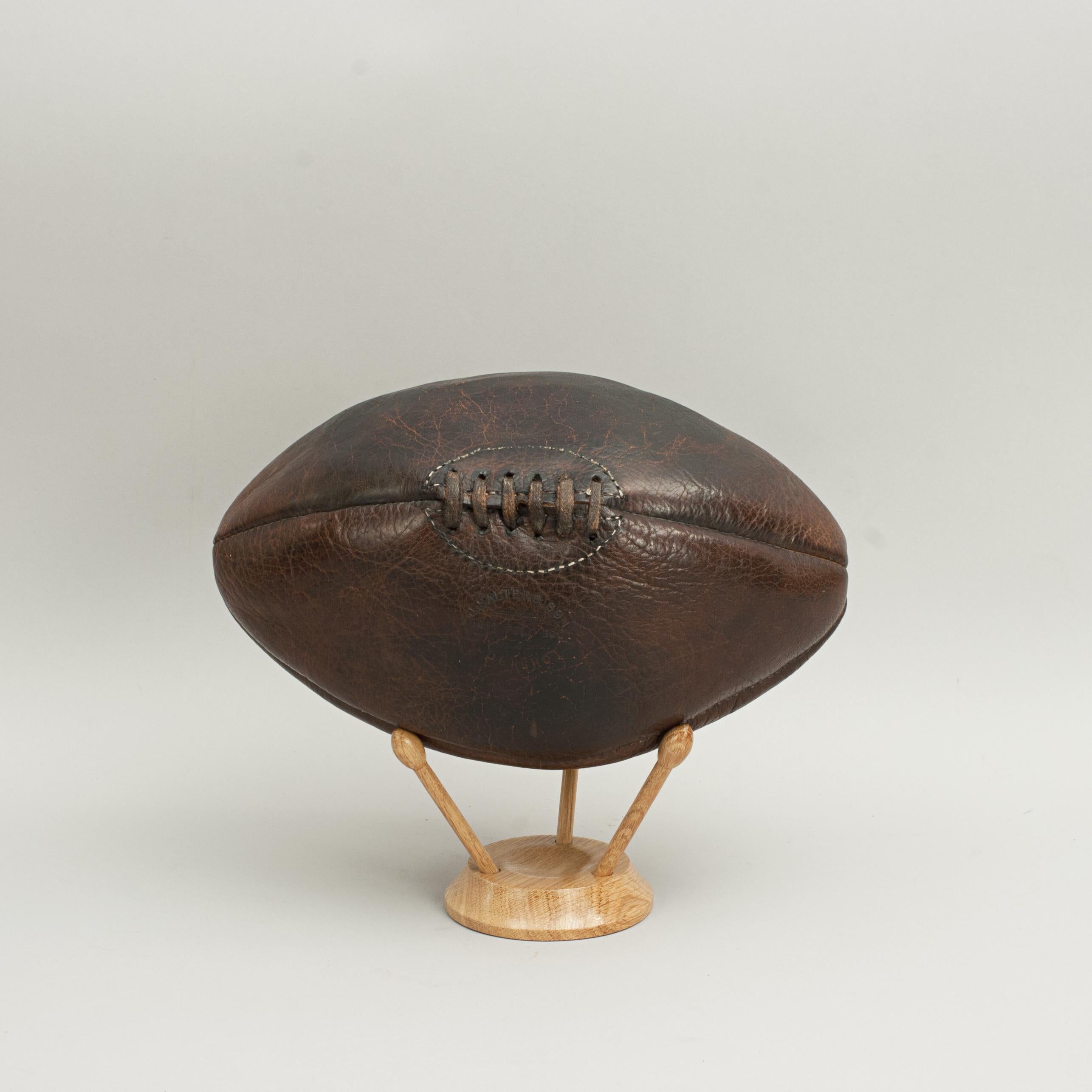 Oak ball stands.
Modern wooden ball stands, ideal for rugby or football balls. The rugby ball can be displayed standing up or on its side. A great way to display your prized balls.

The price shown is for the stand only, the balls in the