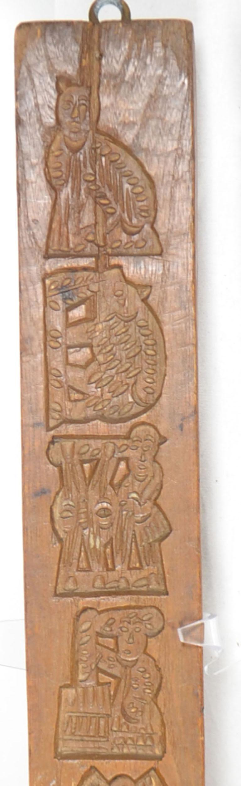 Molde de madera para pan de especias (ocho figuras pequeñas, hombre a caballo, molino de viento, animales, etc.), hacia 1850.