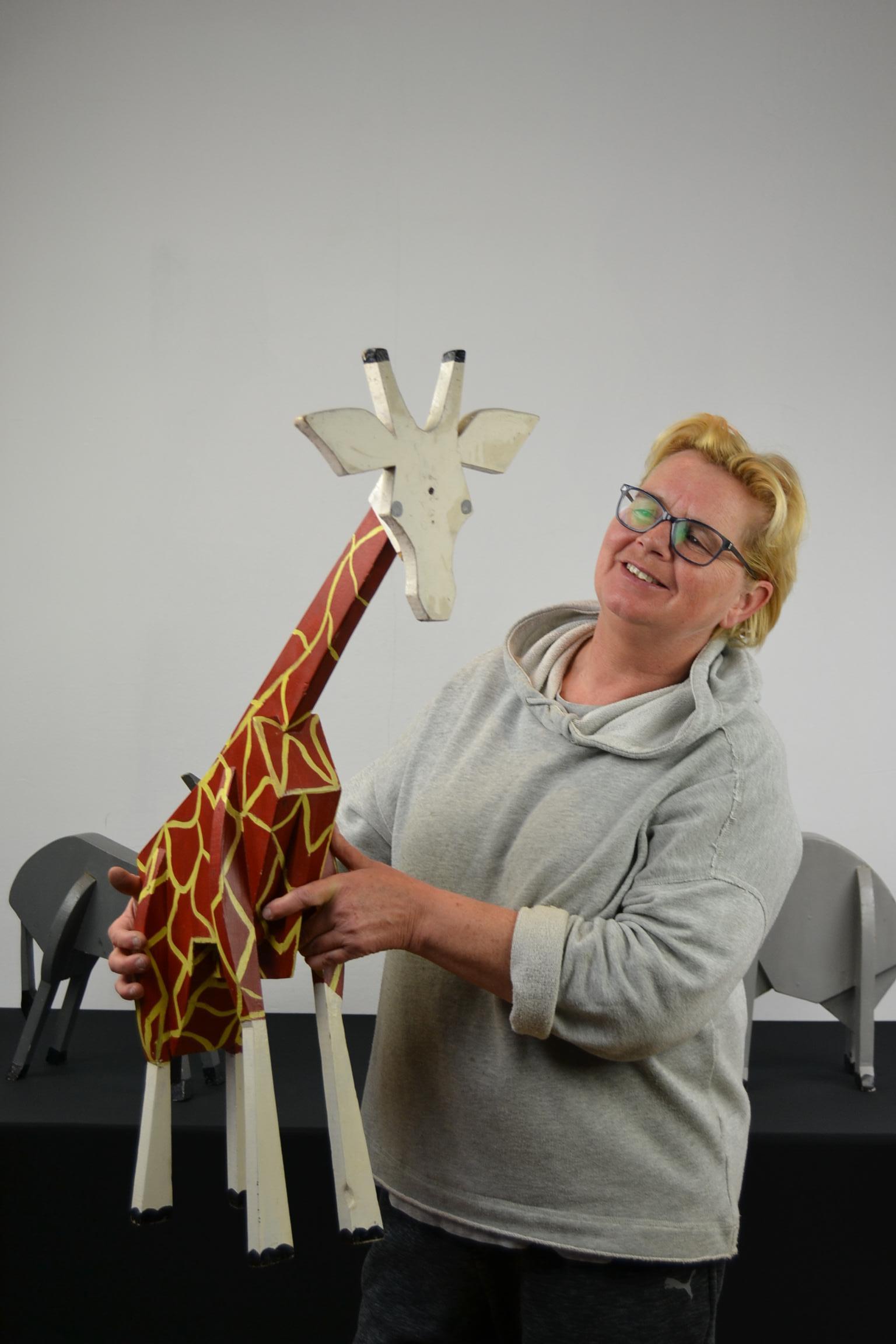 Wooden Giraffe sculpture. 
This hand-painted wooden giraffe will look great in your interior, collection etc.. 
A folk art animal sculpture in the shape of a giraffe. 
This giraffe figurine - giraffe statue dates circa 1950 - 1960. 
We did find