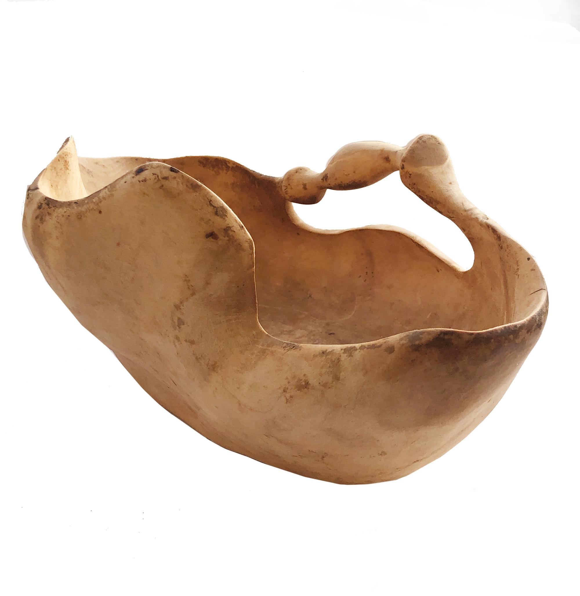 Beautiful and odd: Handcrafted bowl made out of birch wood. The handle is designed for being able to carry vegetables. Made in Vännäs, Sweden by Holger Jonsson, June, 1978. A unique shaped object with original surface.