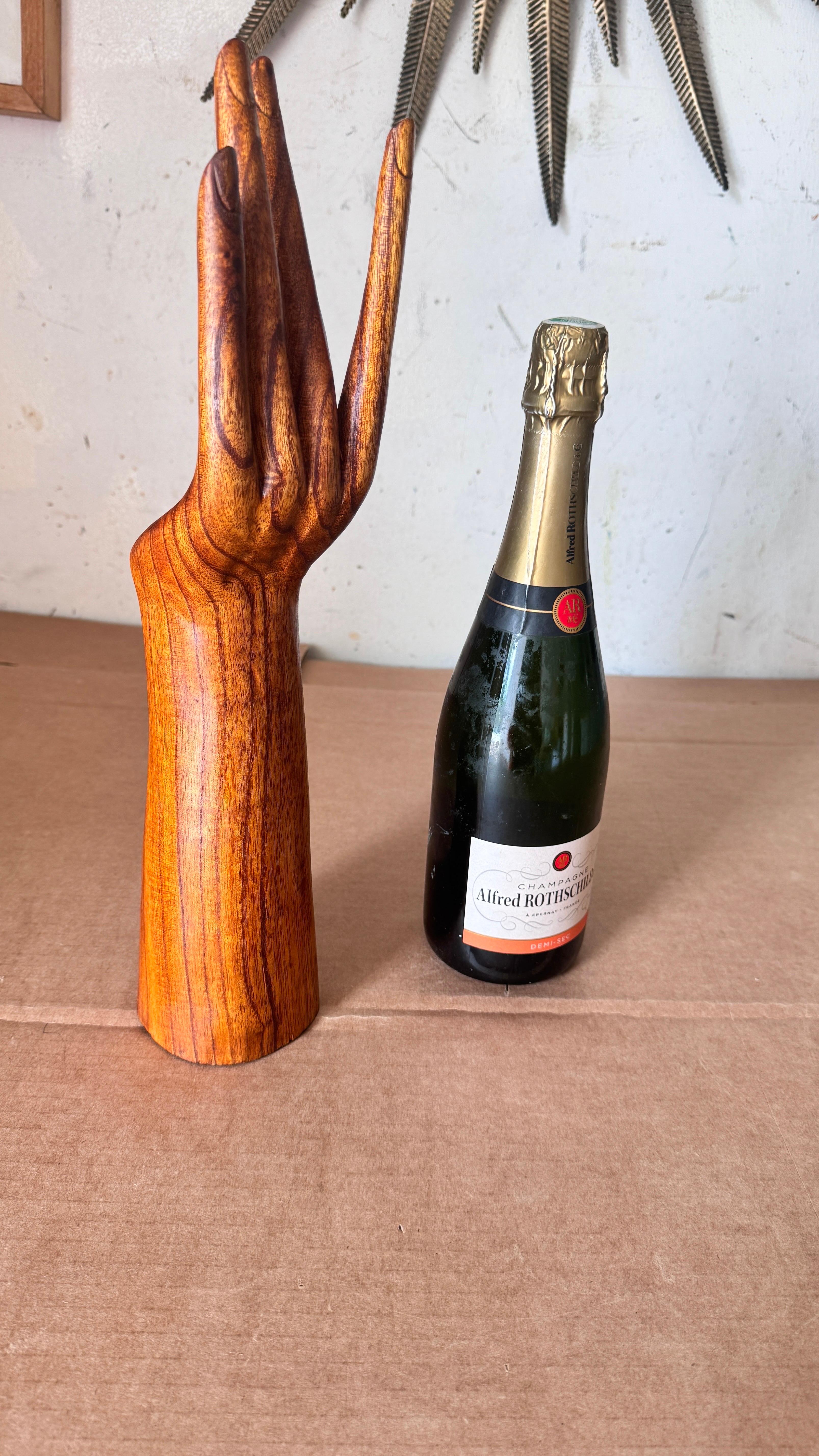 Wooden Hand Jewelry Display Sculpture, Finely Carved with Natural Varnish – Decorative & Functional

Description:
This elegant wooden jewelry display, sculpted in the form of a finely detailed hand and forearm, is both a beautiful decorative object