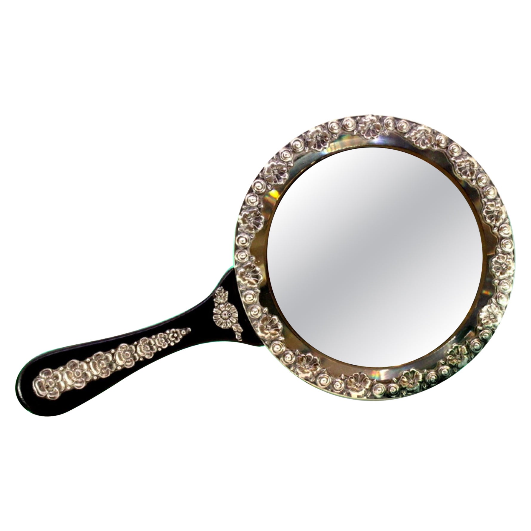 Wooden hand mirror with silver floral appliqués For Sale