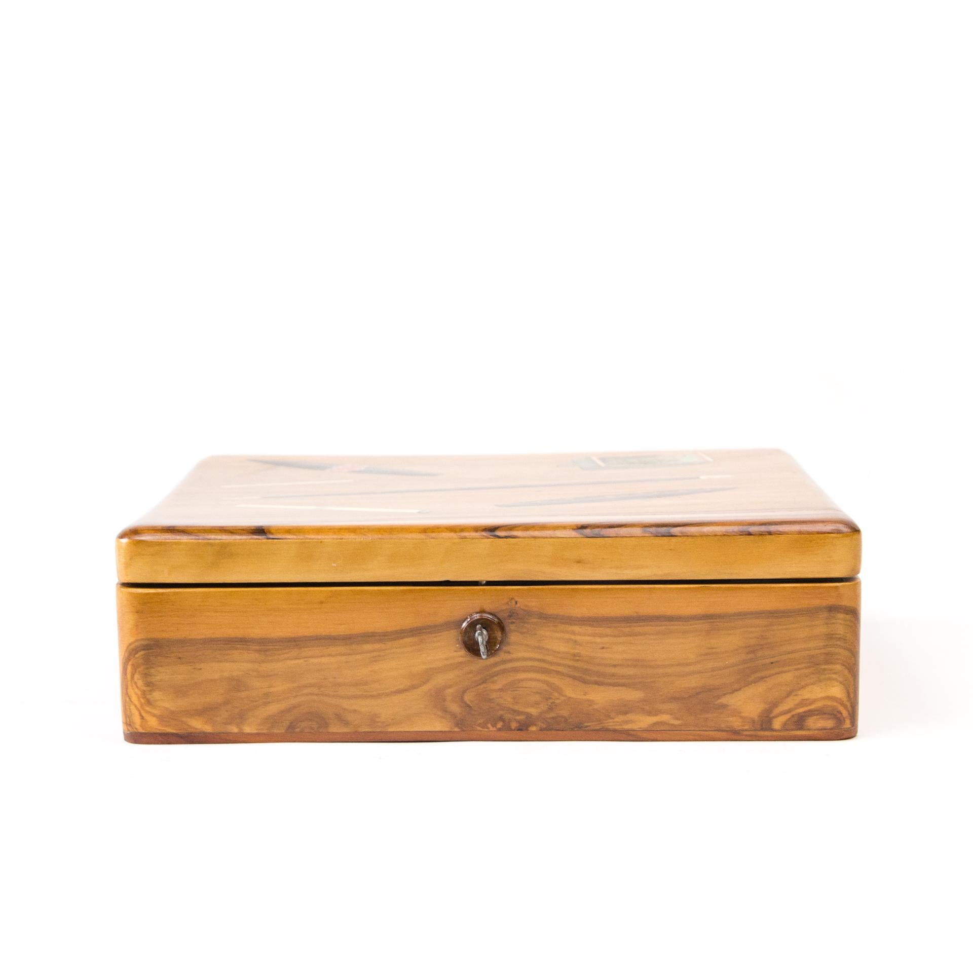 A large wooden box, a box for tobacco products such as cigars, cigarillos and cigarettes. Hand painted and polished. In perfect condition - after maintenance. Lockable - Original hinges and lock.

Luxury item, made to individual order, from high