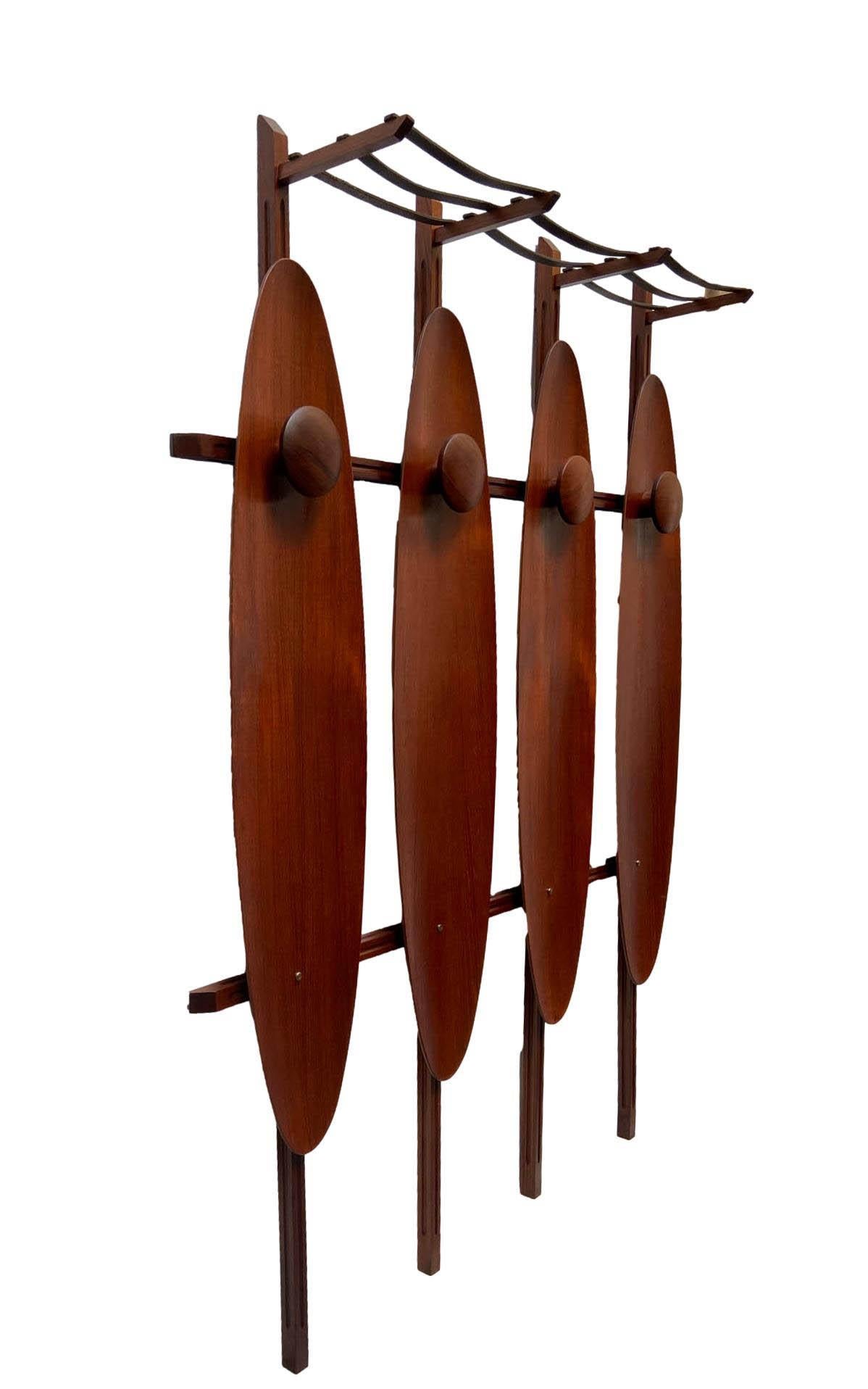 Wall-mounted wooden coat hanger and hat rack with leather straps. Italian manufacture, period 1960s.