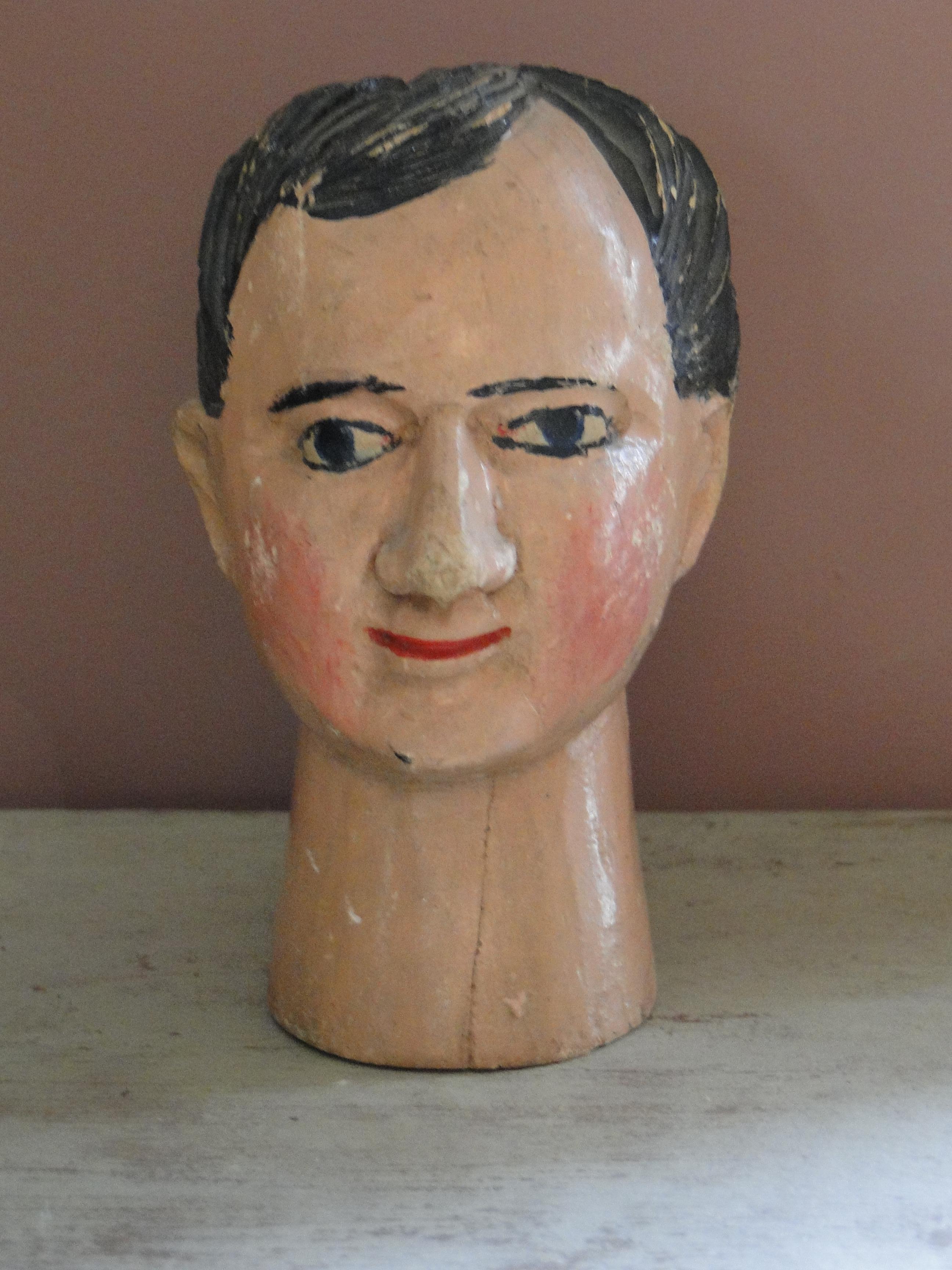 Wooden head sculptured, marionet, puppet head.