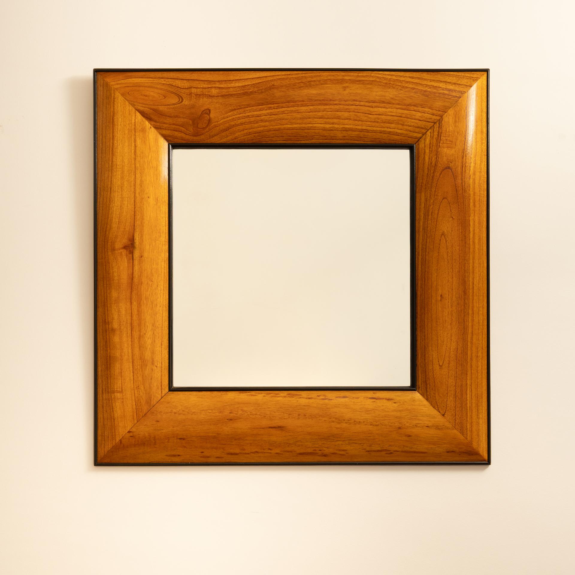 Large Italian mirror from the 1950s. Antique picture frame, composed of a black wooden border (slight signs of use) and a wide curved band of varnished wood. Beautiful volume work with this rounded wood. Unique piece.