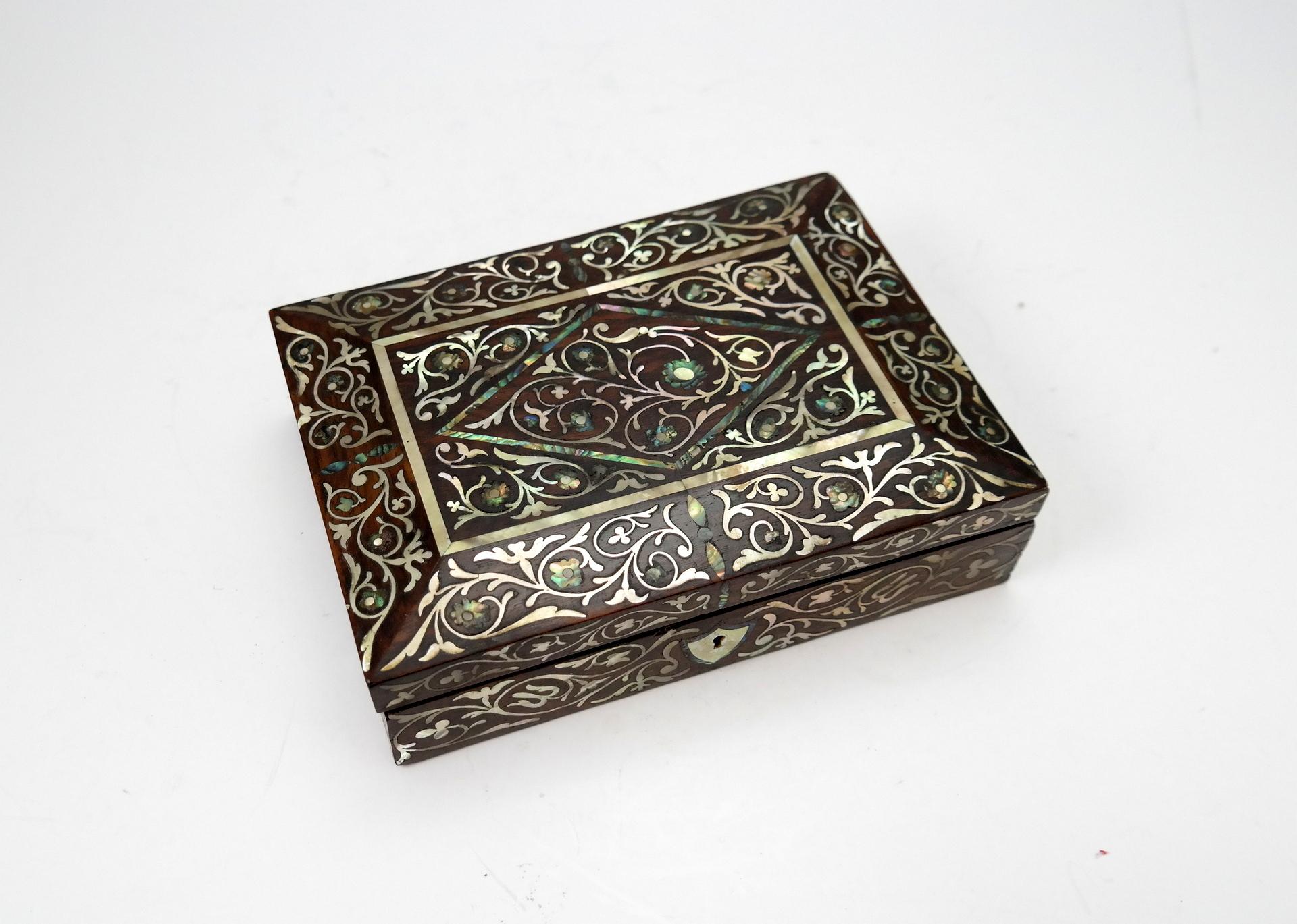 Wooden jewelry/trinket box with mother of pearl inlay.