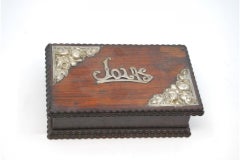 Wooden jewelry box with silver applications