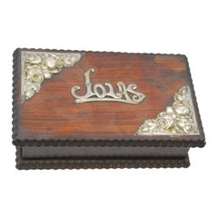 Wooden jewelry box with silver applications