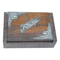 Wooden jewelry box with silver applications