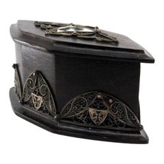 Wooden jewelry box with silver coat-of-arms appliqué and velvet interior Wooden jewelry box with silver coat-of-arms appliqué and velvet interior
