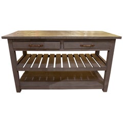 Table de cuisine en bois avec plateau en métal, tiroirs et deux étagères inférieures