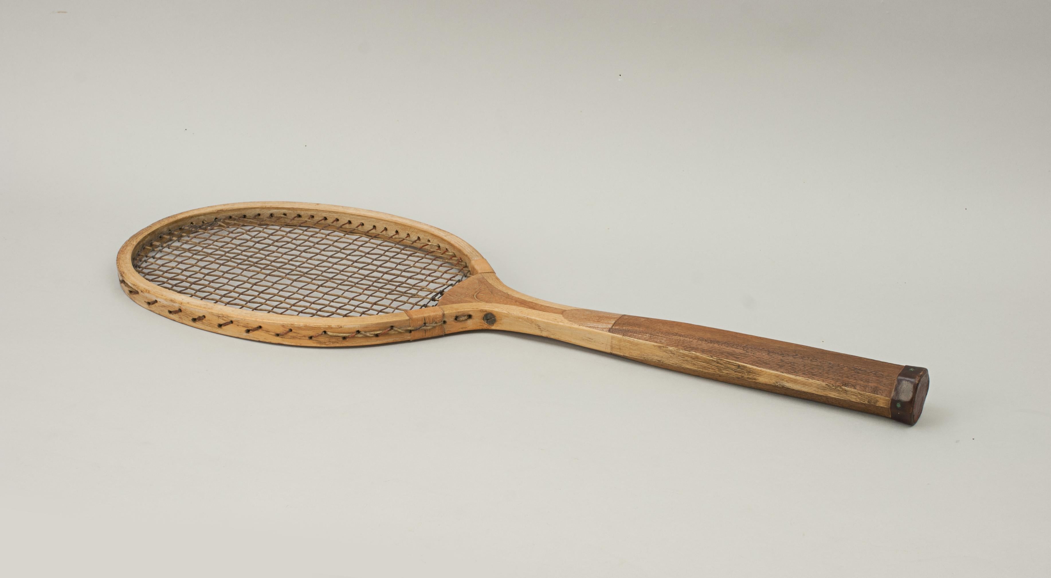 Vintage wooden Lawn Tennis racket, The Service.
A fine Lawn Tennis racket in excellent original condition. The convex walnut wedge stamped 