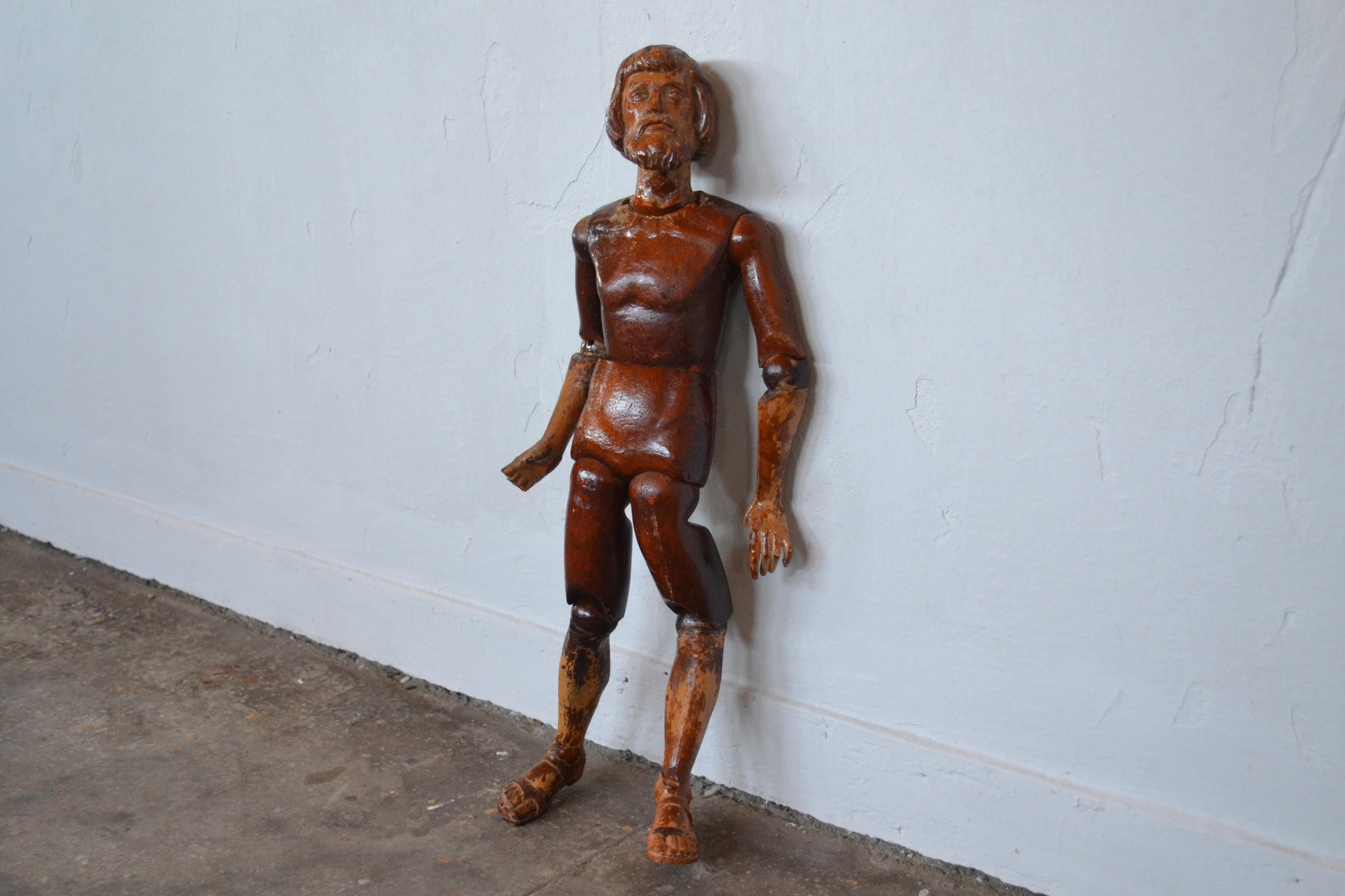 small wooden mannequin