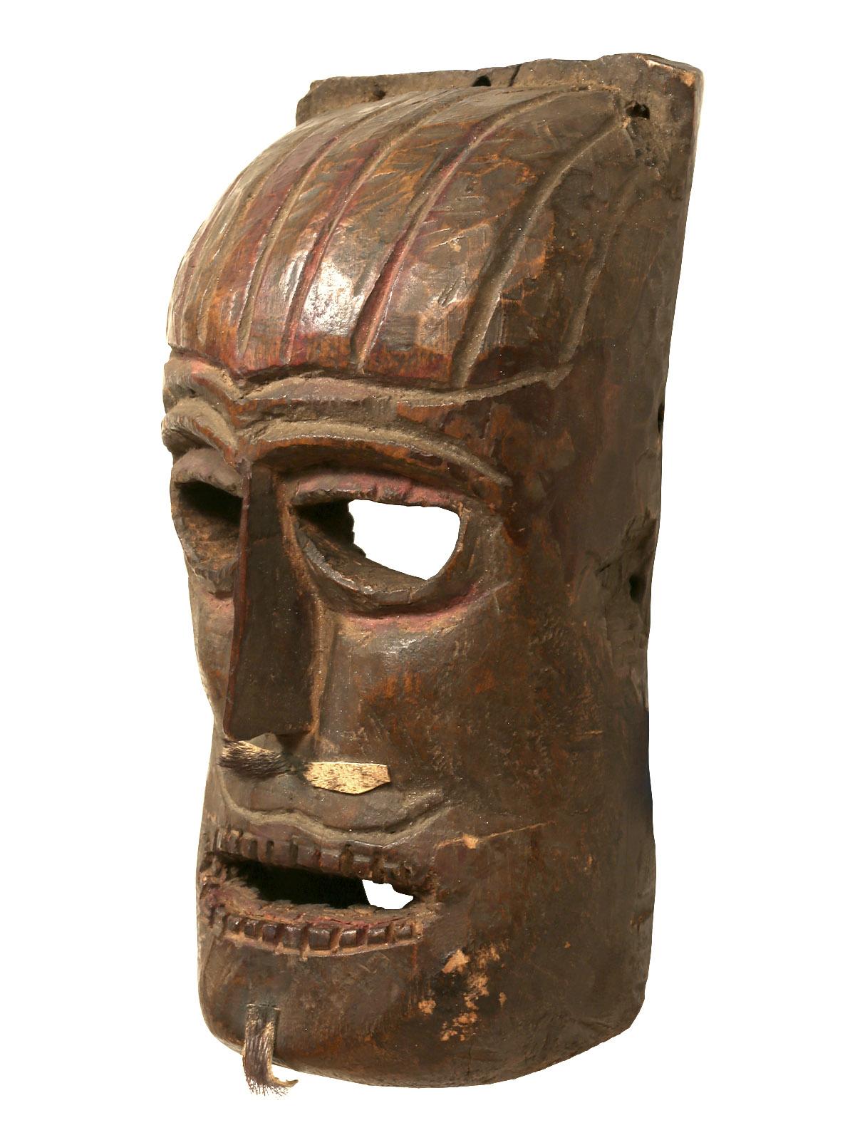 Wooden Mask, Karnataka, India, Mid-20th Century

Carved wood with fur and pigment decoration.

 