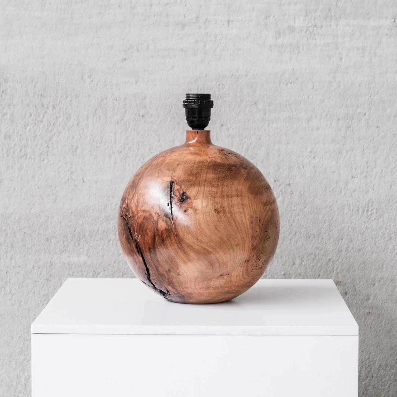 A chunky spherical wooden table lamp. 

France, c1950s. 

Wabi sabi style esque, celebration of wood and its imperfections. 

Good vintage condition.

Since re-wired and PAT tested. 

Location: Belgium Gallery.

Dimensions: 32 H x 27
