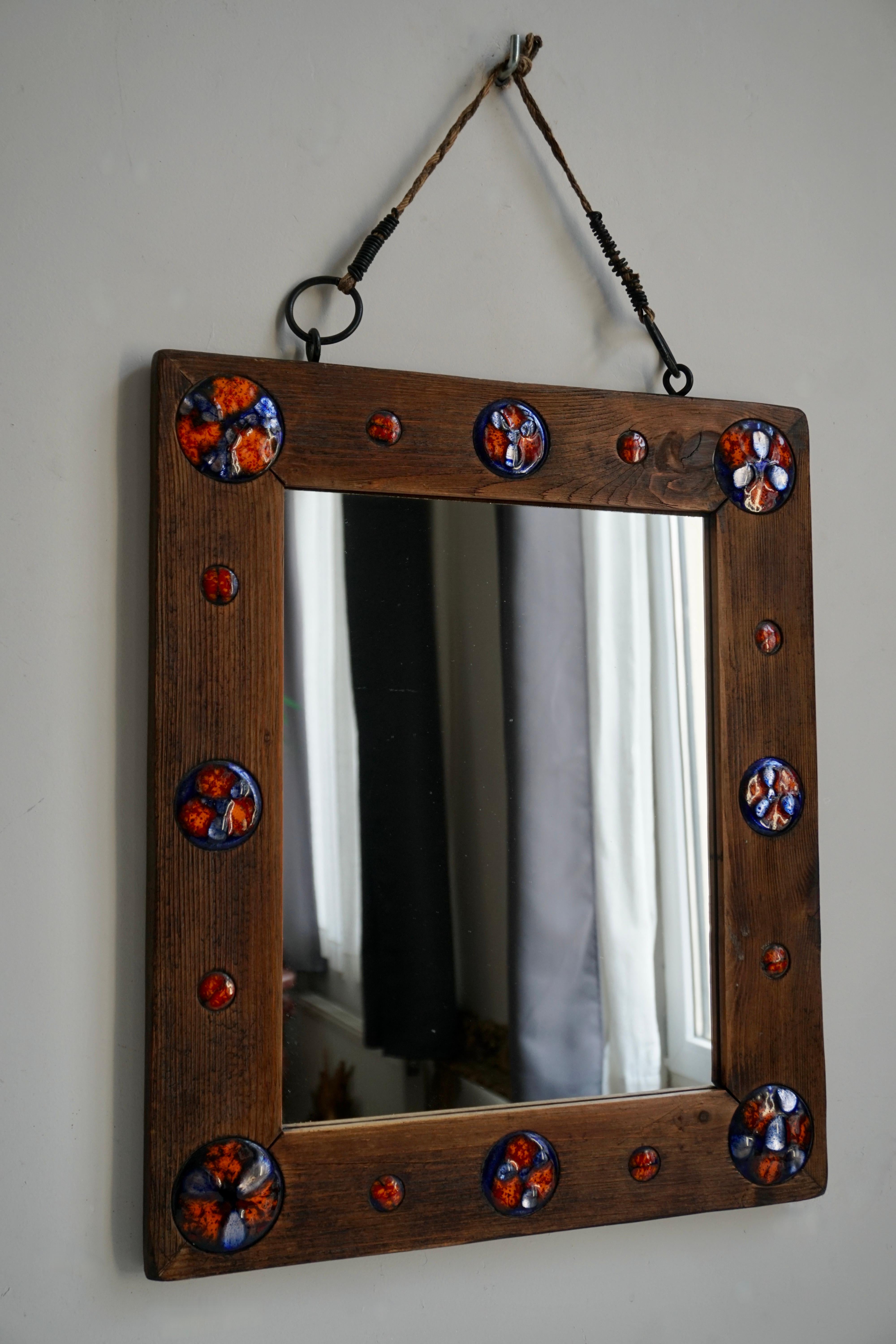 Belgian Wooden Mirror with Enamel Decorations For Sale