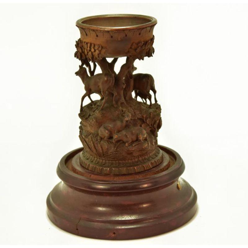 Object in a bell jar, a sort of black forest style cup. Probably German or Austrian object from the 19th century. DPA

Additional information:
Material: Fruit woods.